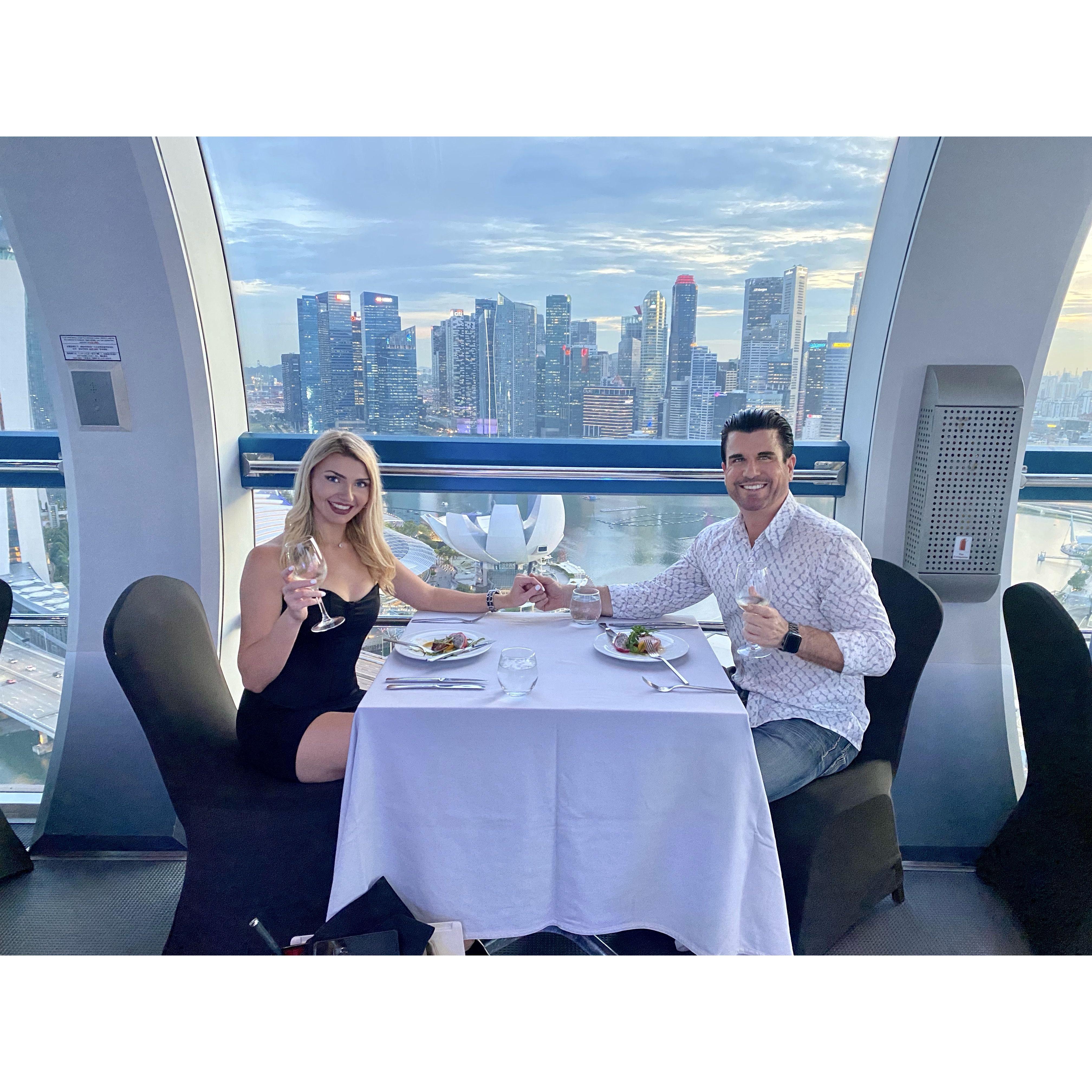 Romantic Sunset Dinner in the Singapore Flyer as the cities lights come on