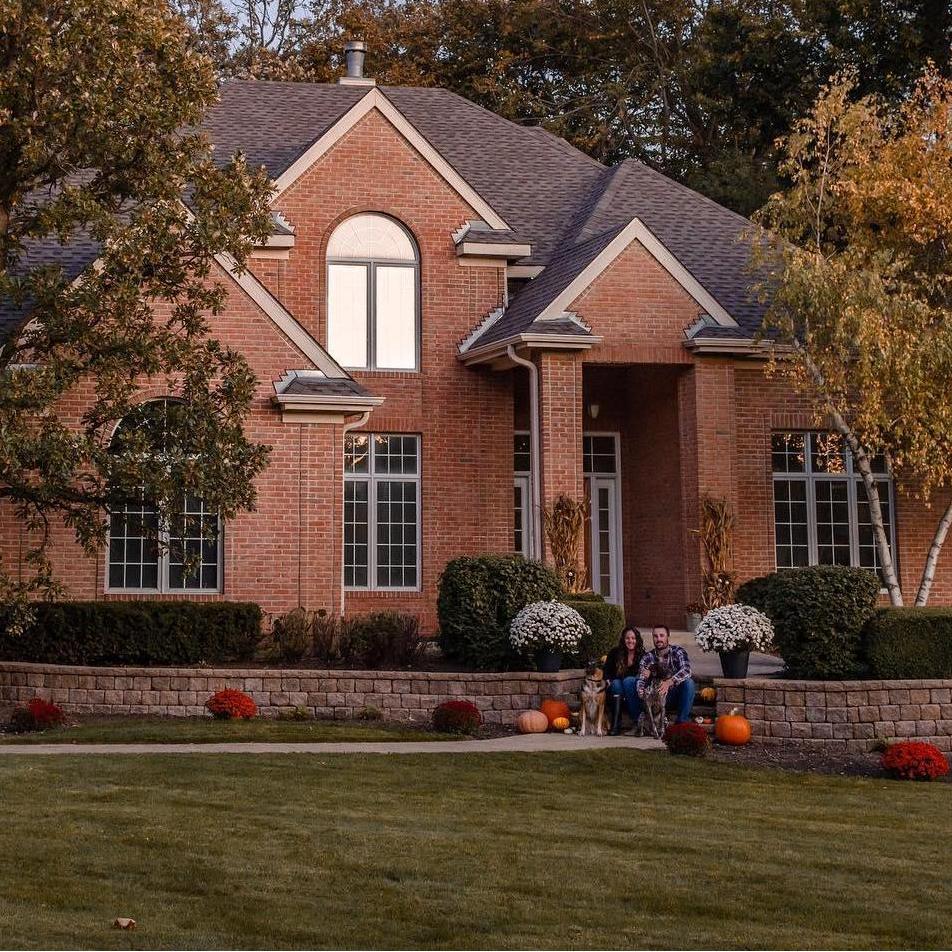 Family photo in front of our first home