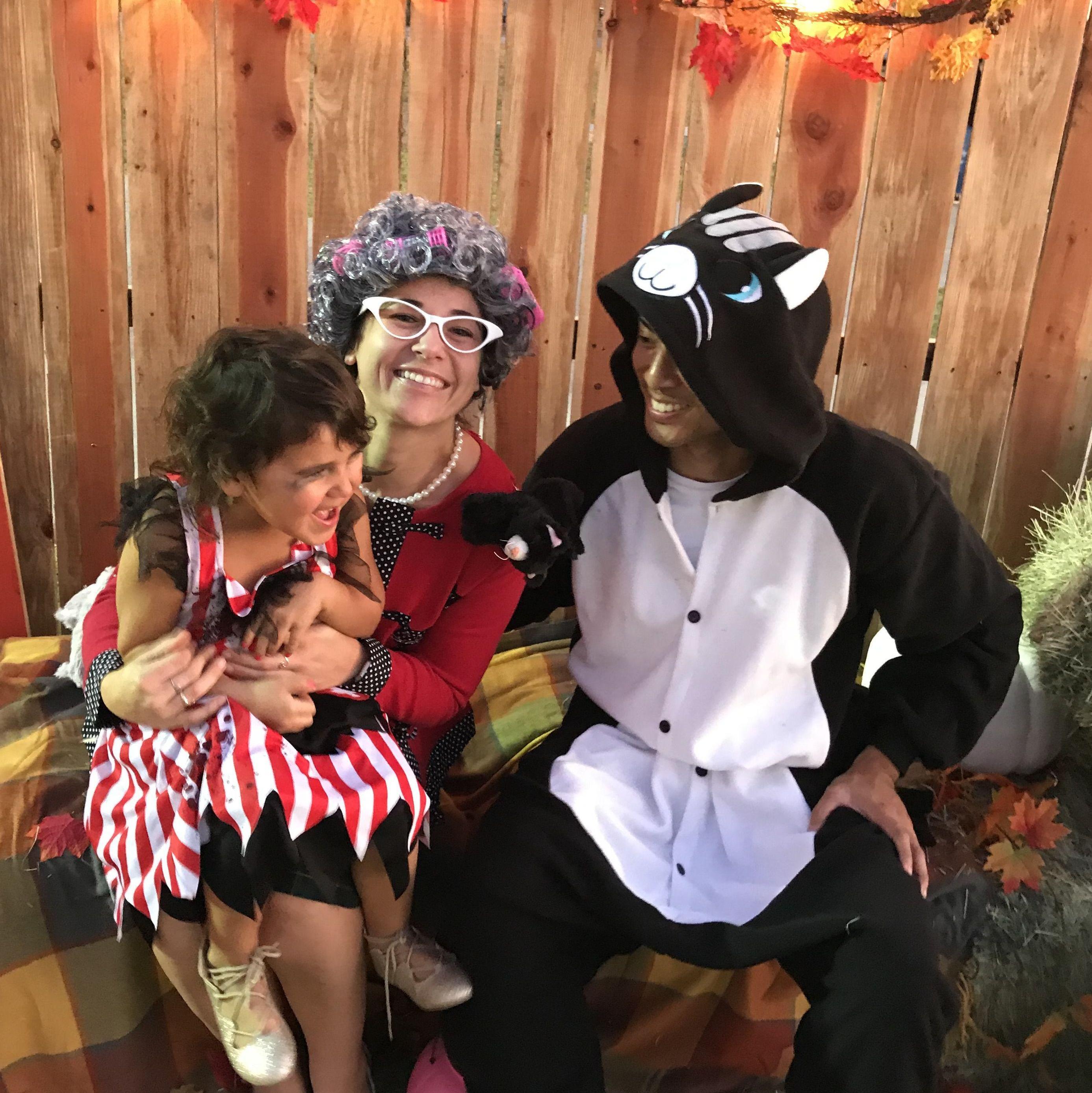 Reilly was as a cat lady and Carder was her cat at the McCabe Halloween carnival.