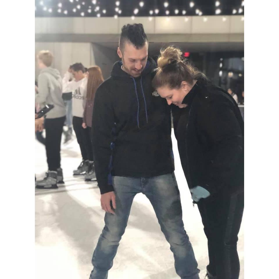 Gerrit showing me how to not fall on my face while ice skating