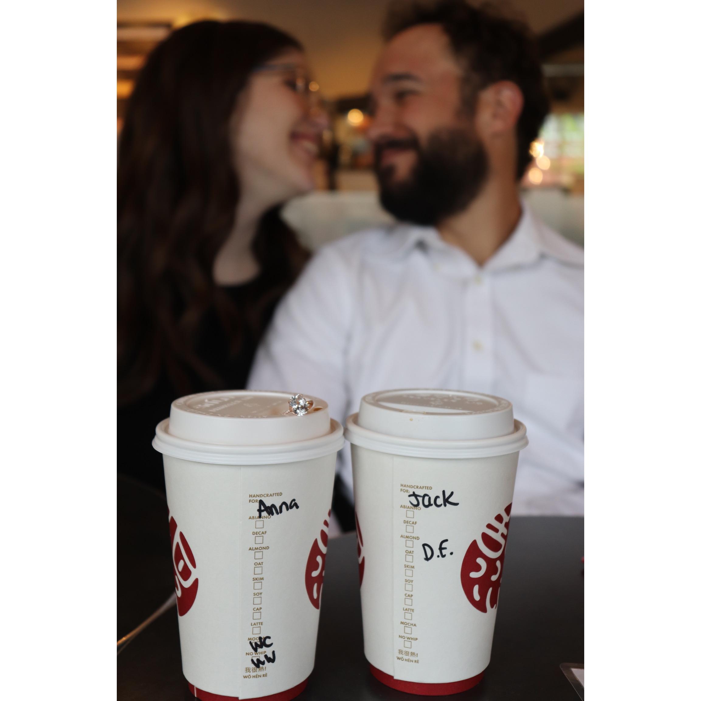 During some downtime while taking our engagement pictures, one of our favorites because we love coffee!