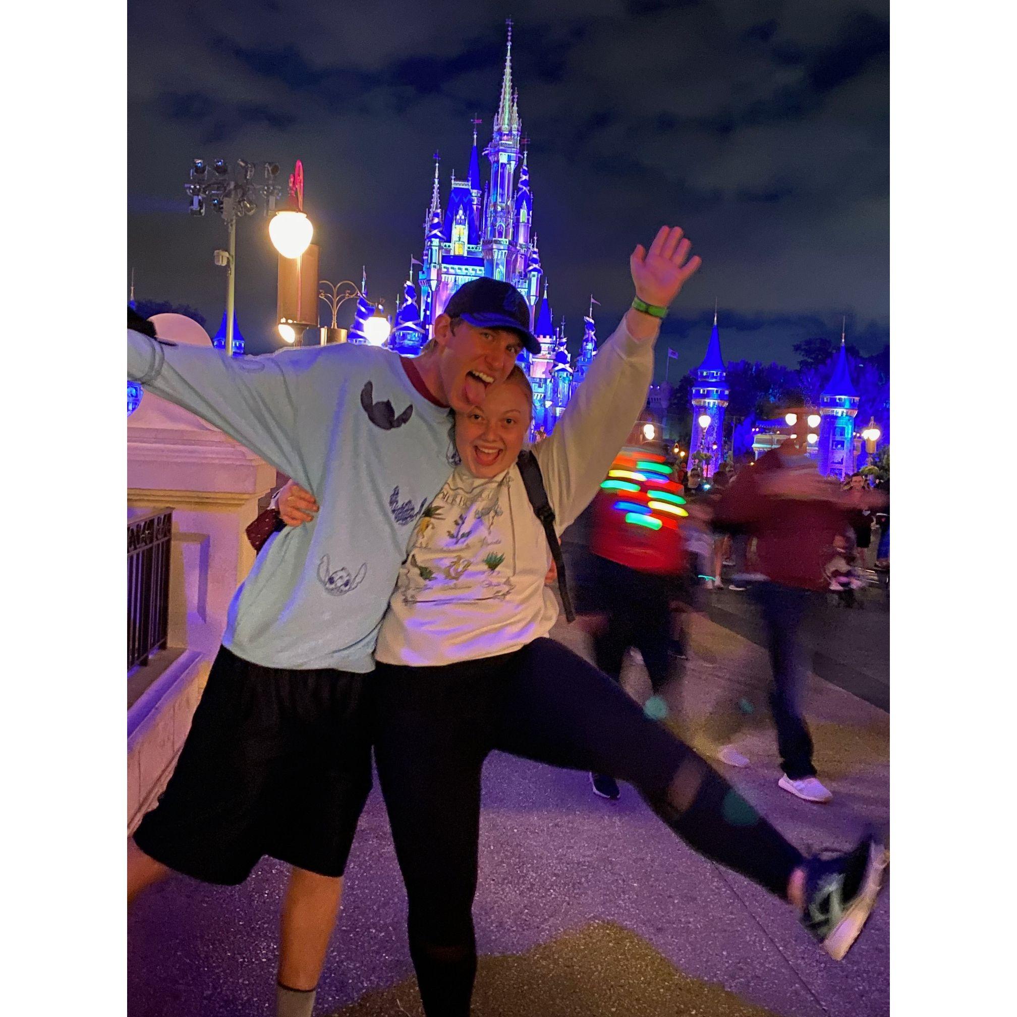 Just being silly in front of the castle at Magic Kingdom in November 2021 - very on brand for us.