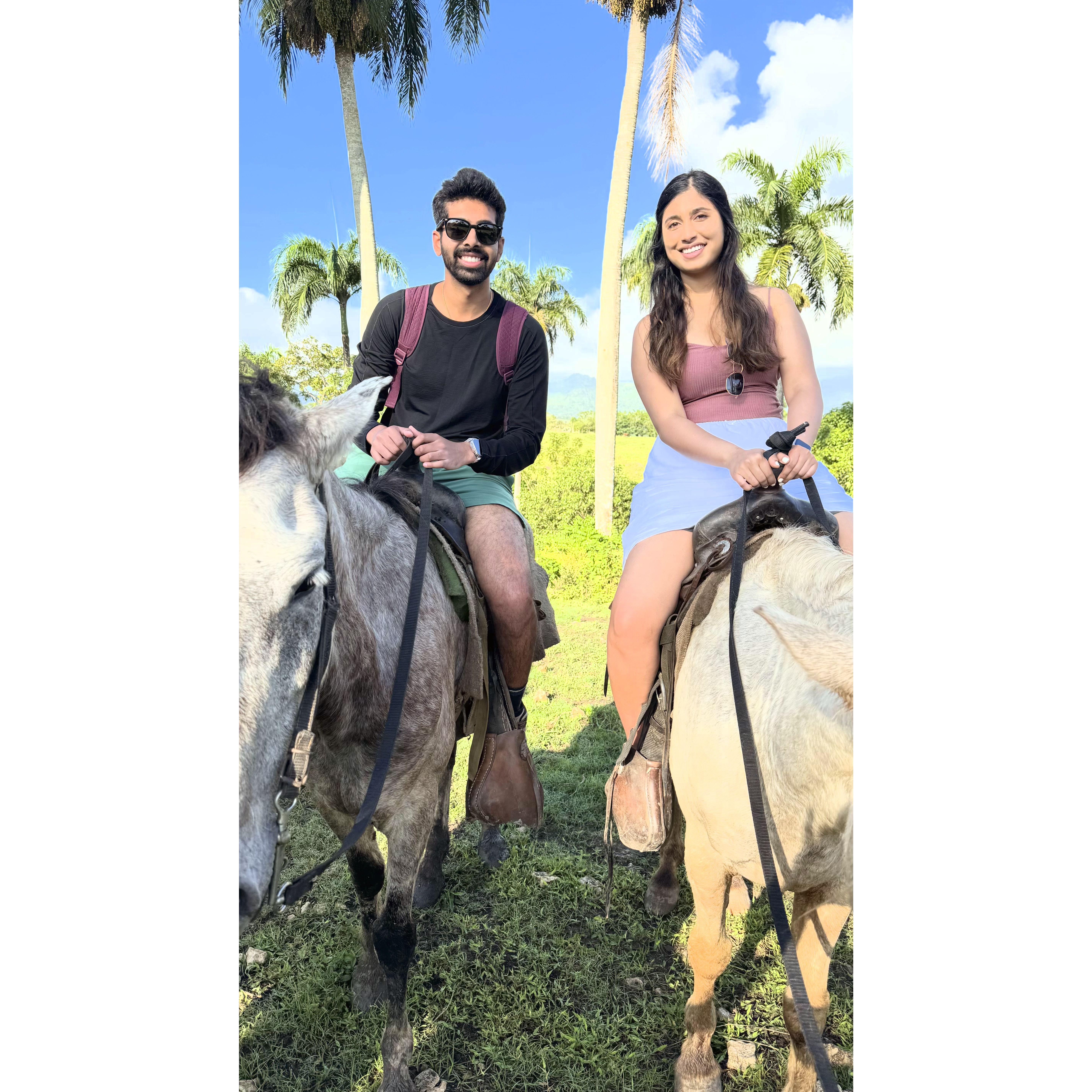 Megana and Rajeev riding horses together in Punta Cana, Dominican Republic (interestingly, the horses' names were Obama and Pepe)
