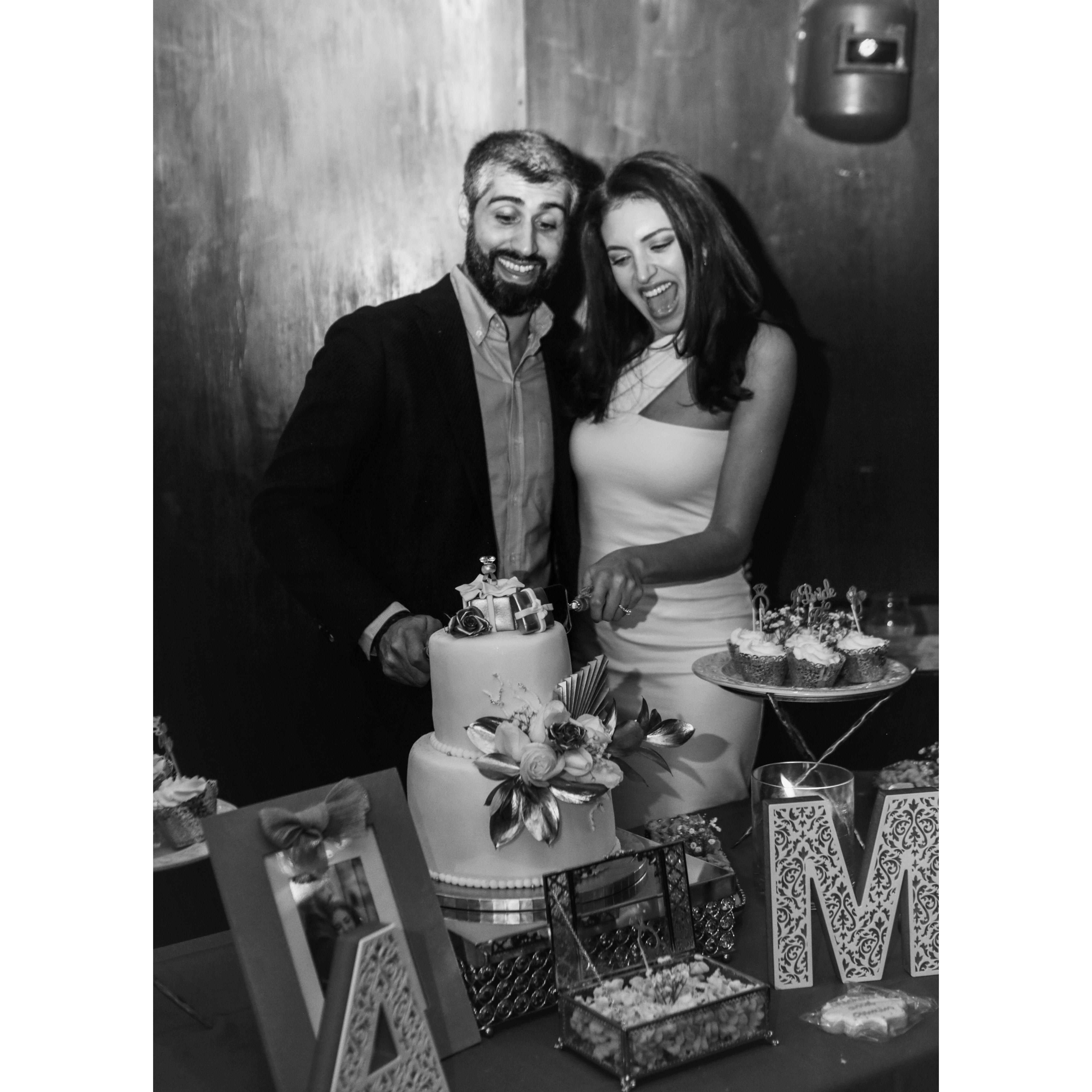 Getting practice so we can cut our future wedding cake well!