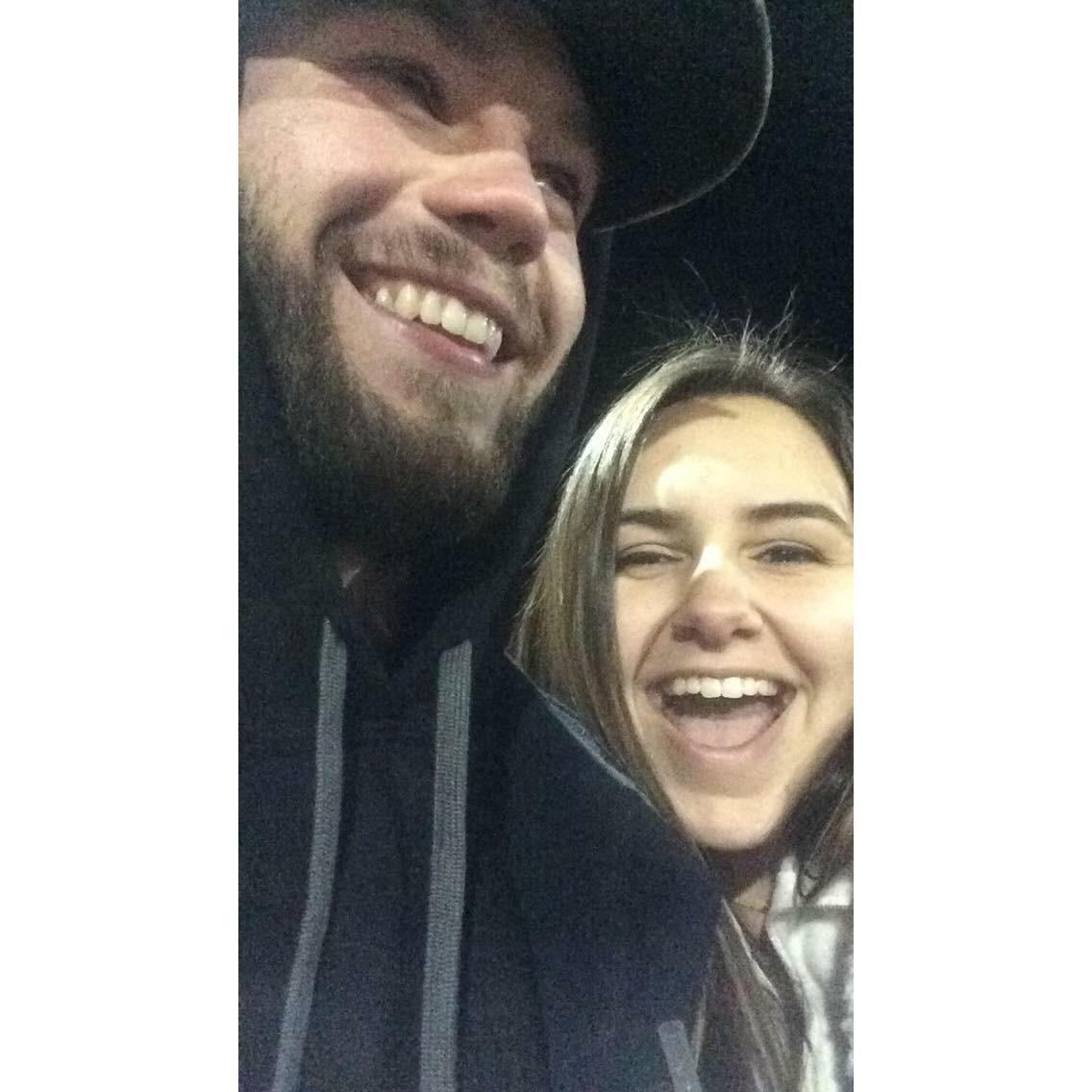 2015: Joshua asked me out twice & each time I said no. October 10, 2015 we went to the NH grass drags & I was having an amazing time & looked at him randomly & said yes. This picture was right after!