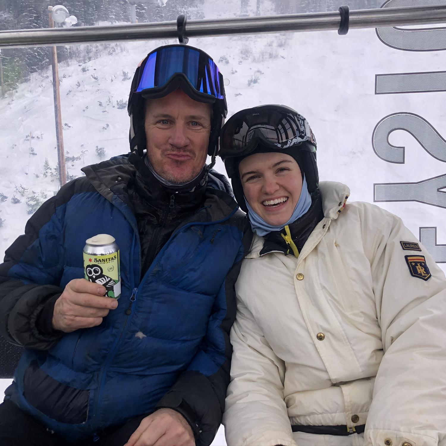 Lucille and papa Jeff Nelson snowboarding in Vail, CO.