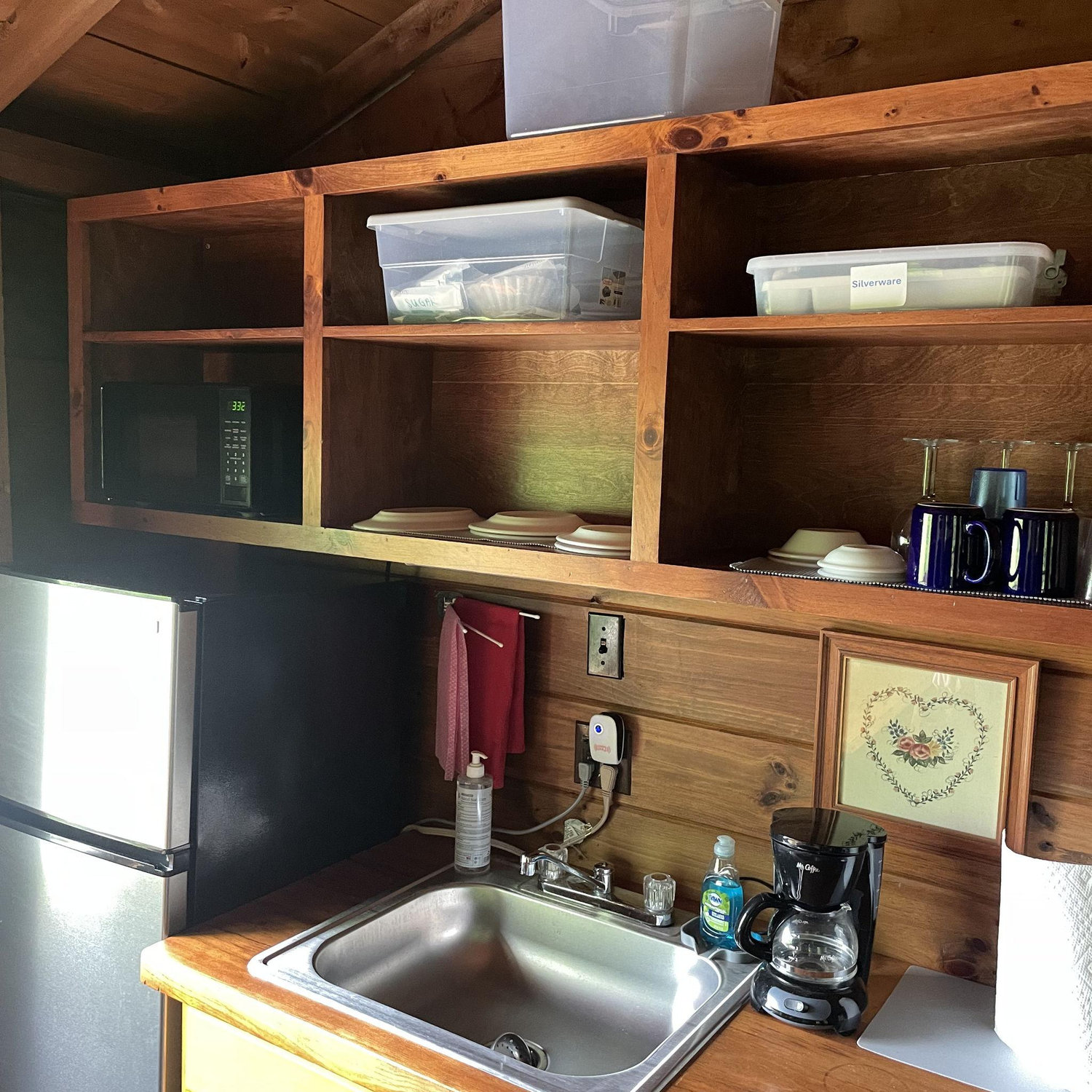 Cabins stocked with coffee and tea.
Each cabin has a fridge, microwave, and sink.
