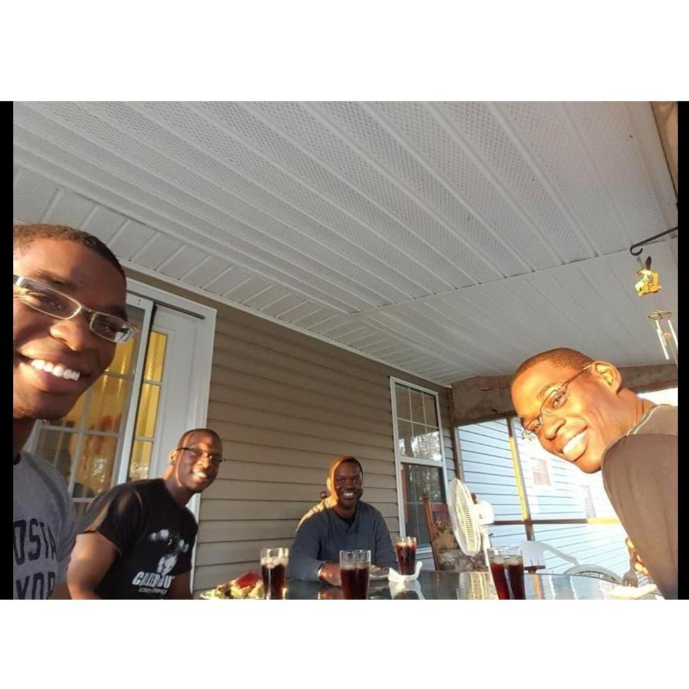 Devin with Brother Darelle, his Dad & Brother Dequentin