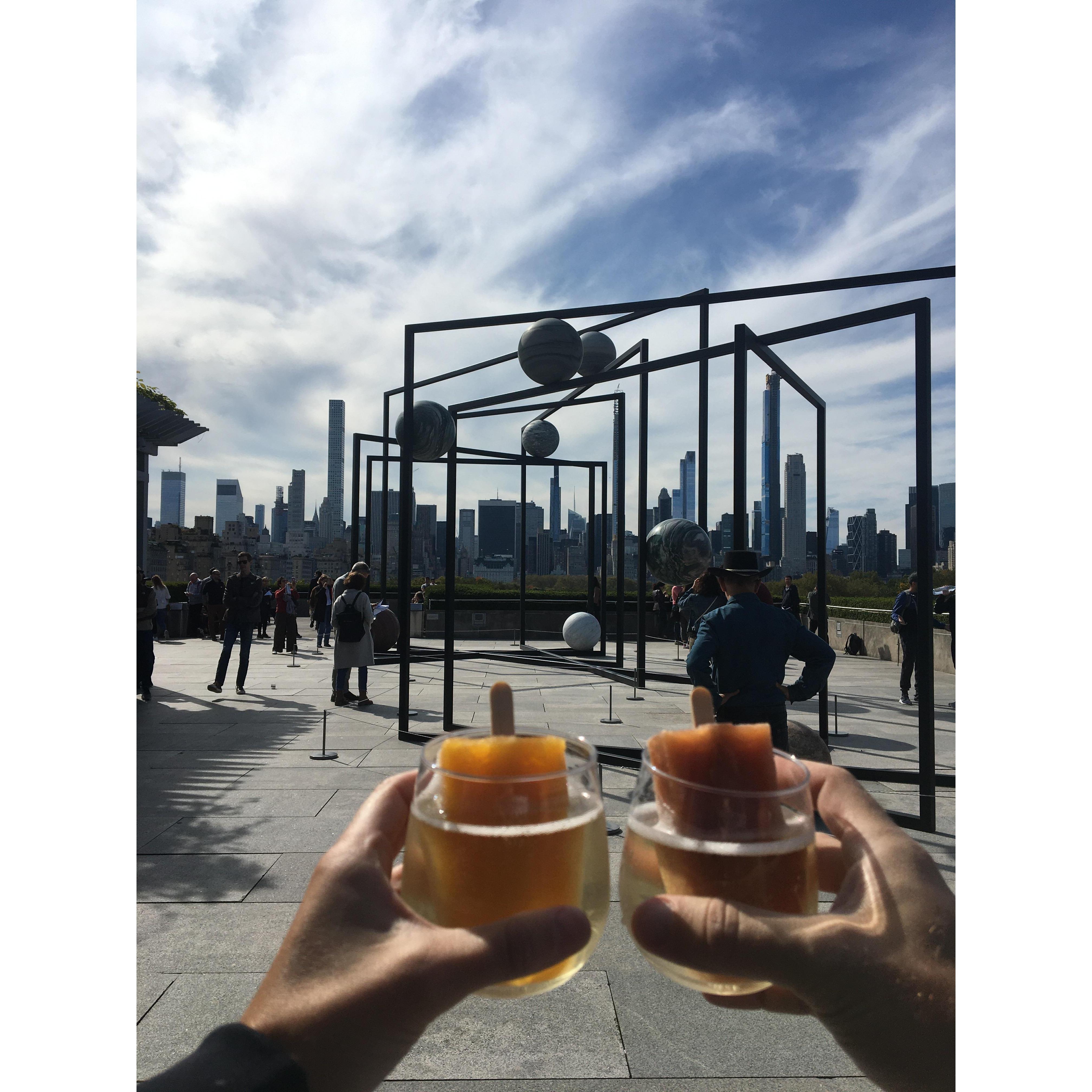 Cheers to art and rooftops