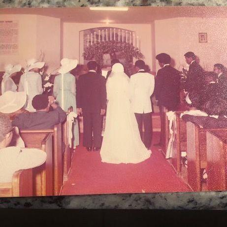 Stephen and Deneese saying their initial vows:  "I do!"  (1974)