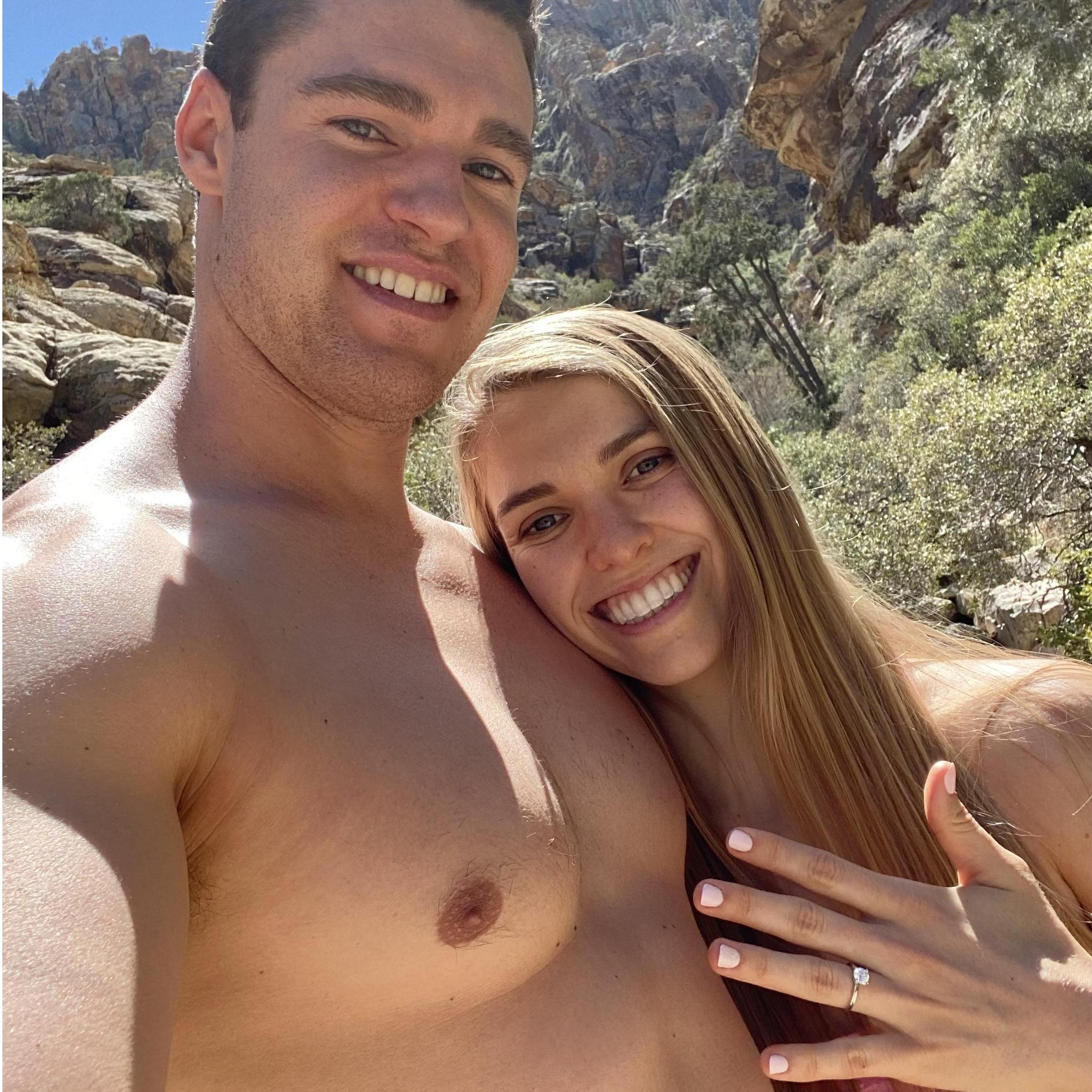 Red Rock Conservation Area on John's secret hiking trail, John surprised Megan and asked him to marry her.  This photo was taken just moments after he proposed. She was stunned!