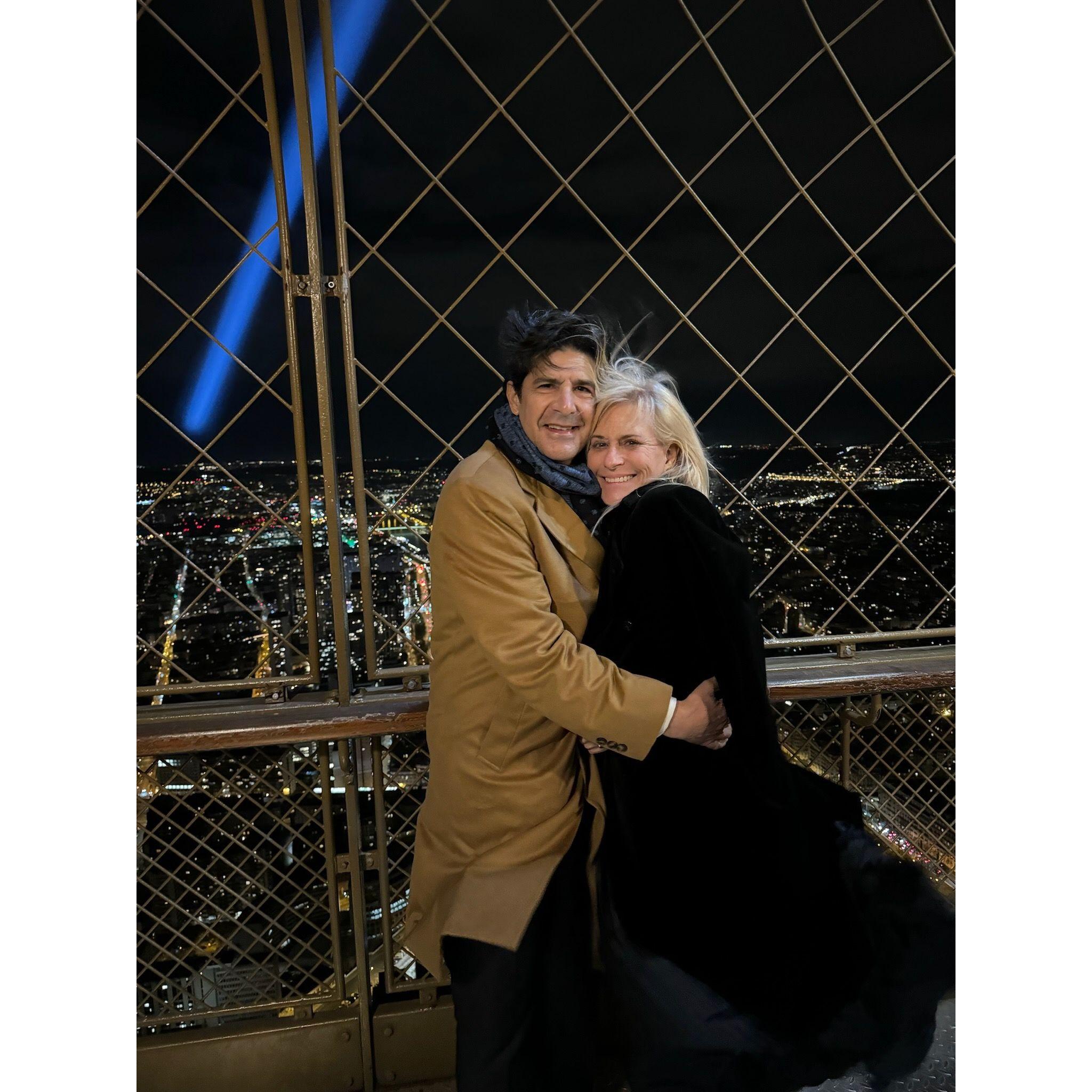Just after the proposal at the top of the Eiffel Tower February 14, 2024. The wind was blowing and our hearts were full!