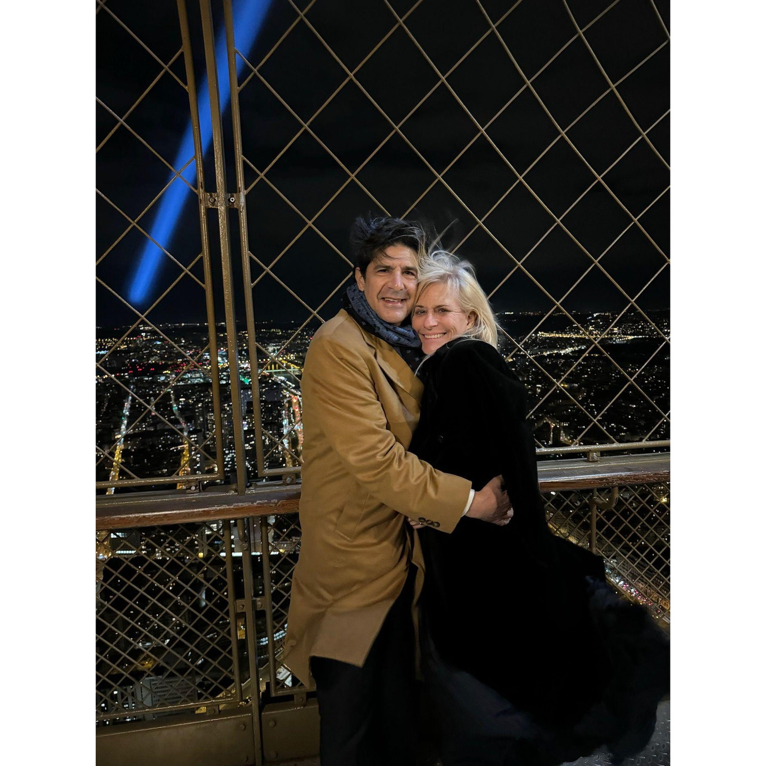 Just after the proposal at the top of the Eiffel Tower February 14, 2024. The wind was blowing and our hearts were full!