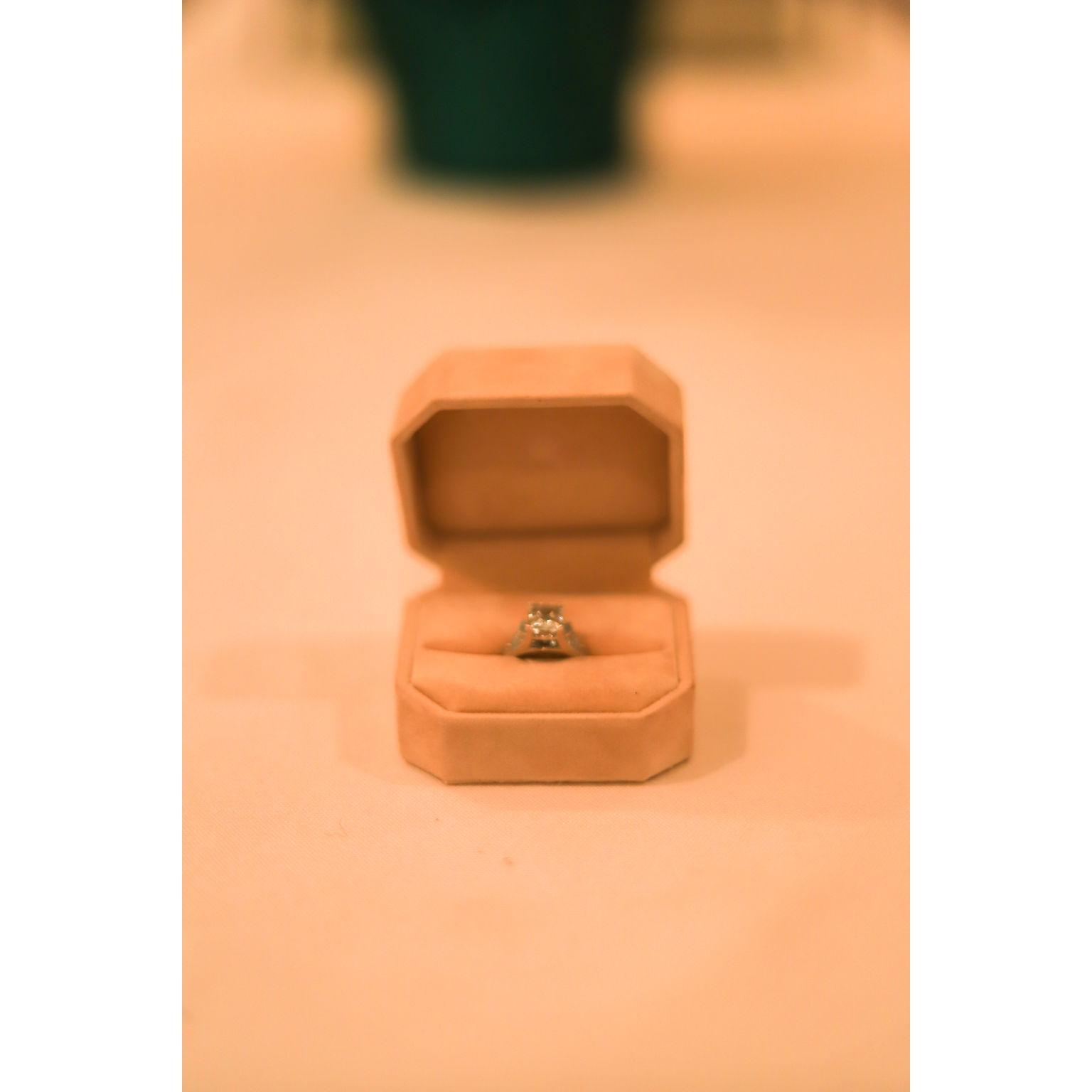 Stian custom-designed my ring using stones from one of his mother's rings. It means so much to me that he made this ring specifically for me with stones that had meaning to his family.