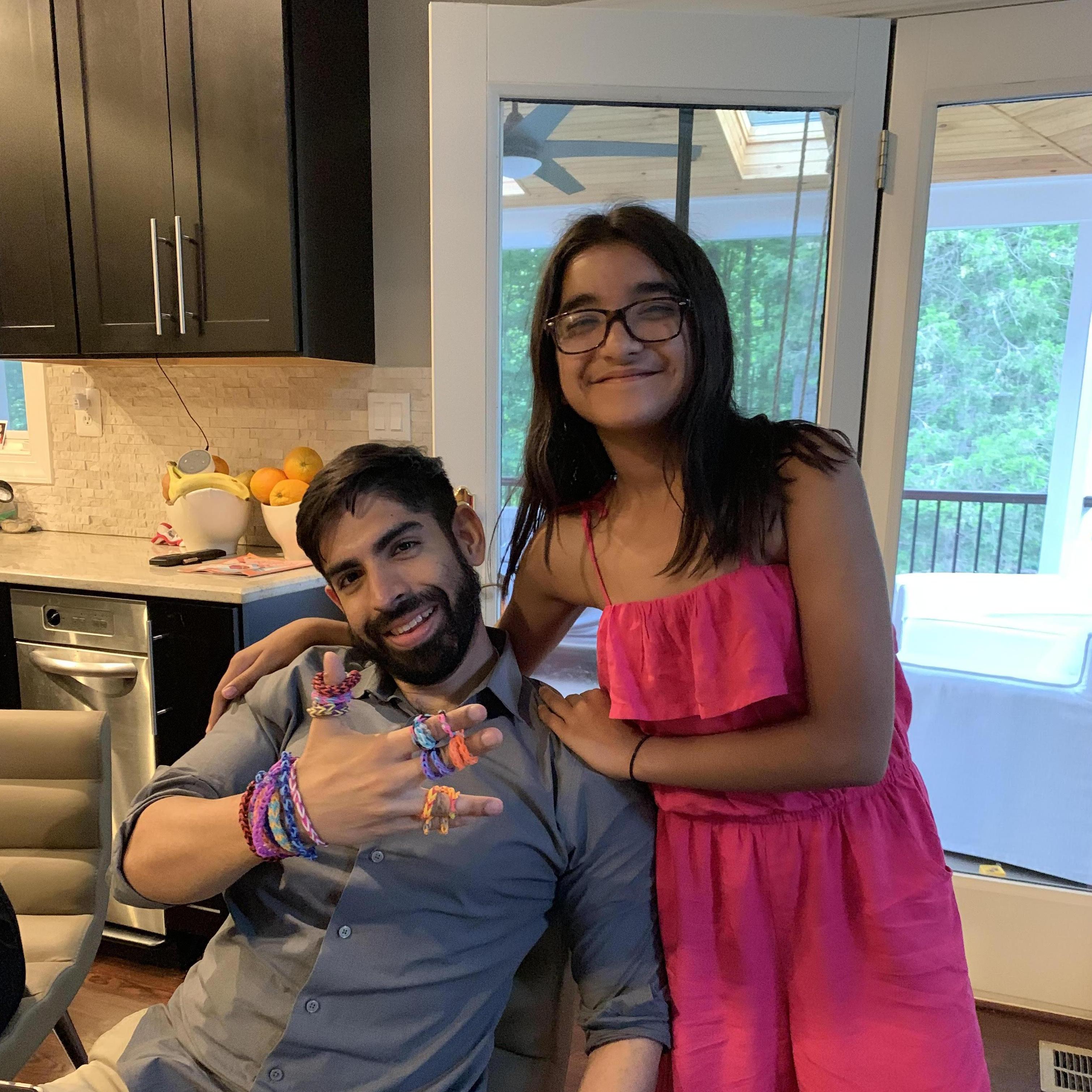 Kush and Lil Anna! She was showing us how to make all these fun bracelets!! We are huge fans!
