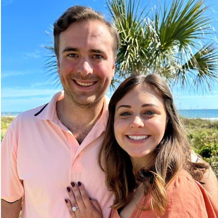 Showing off the new bling at a delicious post-proposal brunch
