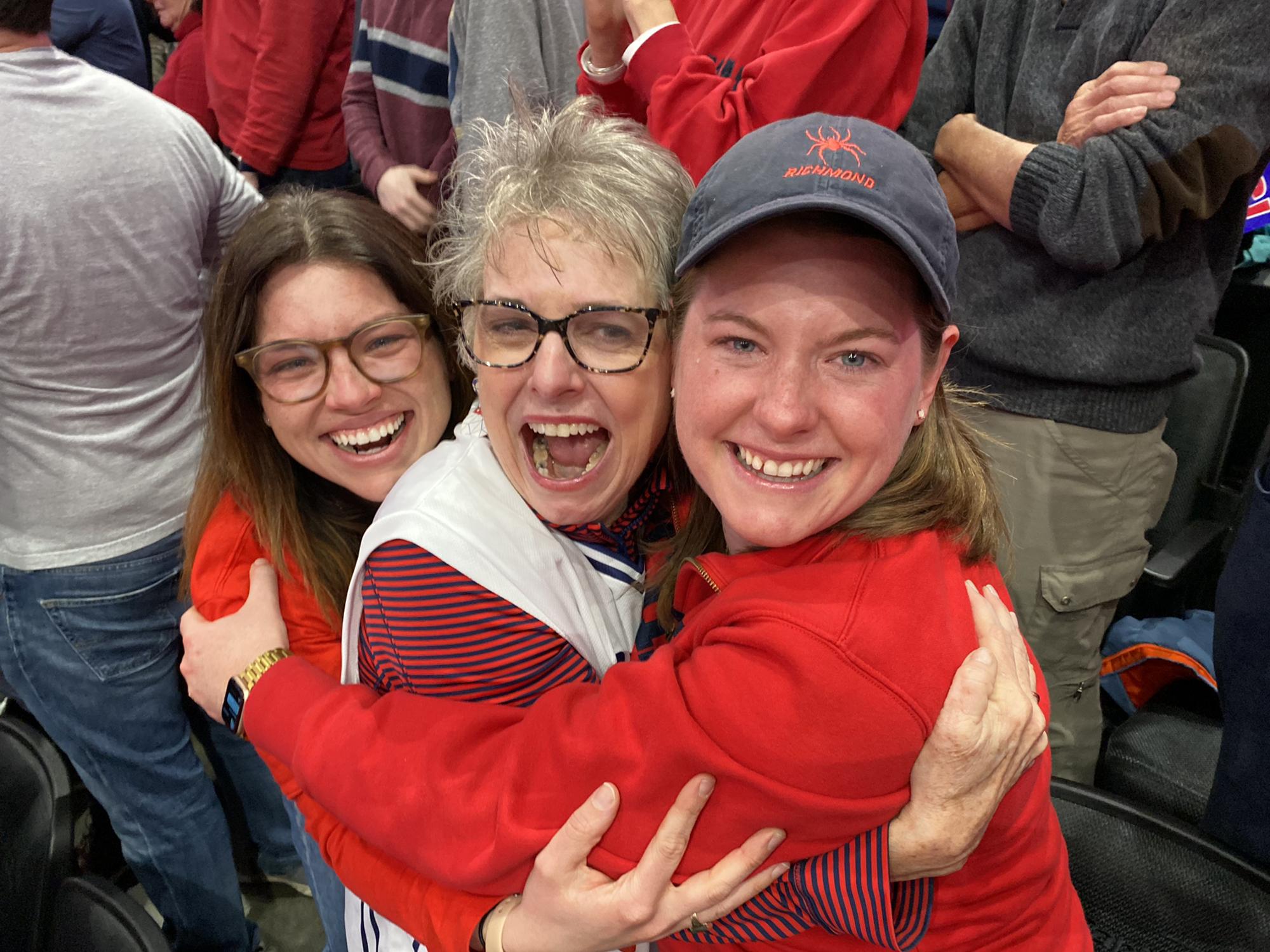 Amelia, sister Erica, and Mom Allison overwhelmed at Richmond Men's Basketball A-10 Championship.  March 2022.