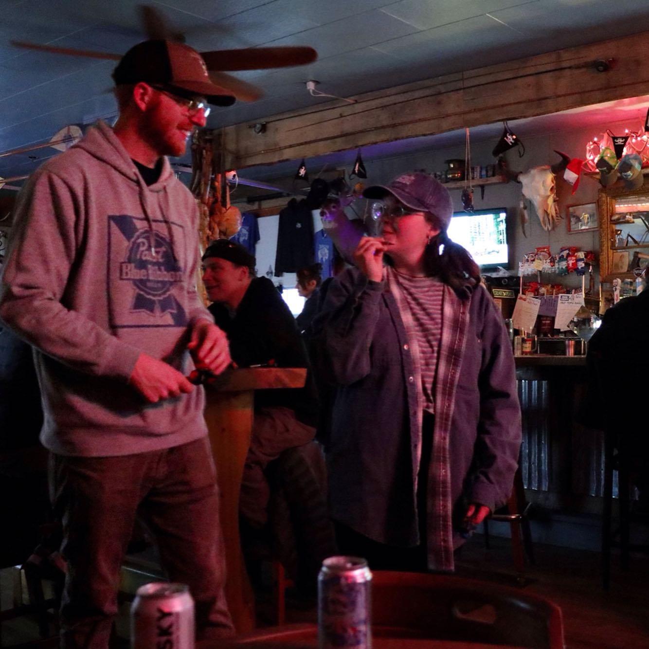 An early photo of Cole and Miranda taken by Miranda's dear friend Nicole. This photo is the most "us" as it is Cole patiently playing darts while Miranda sasses him.