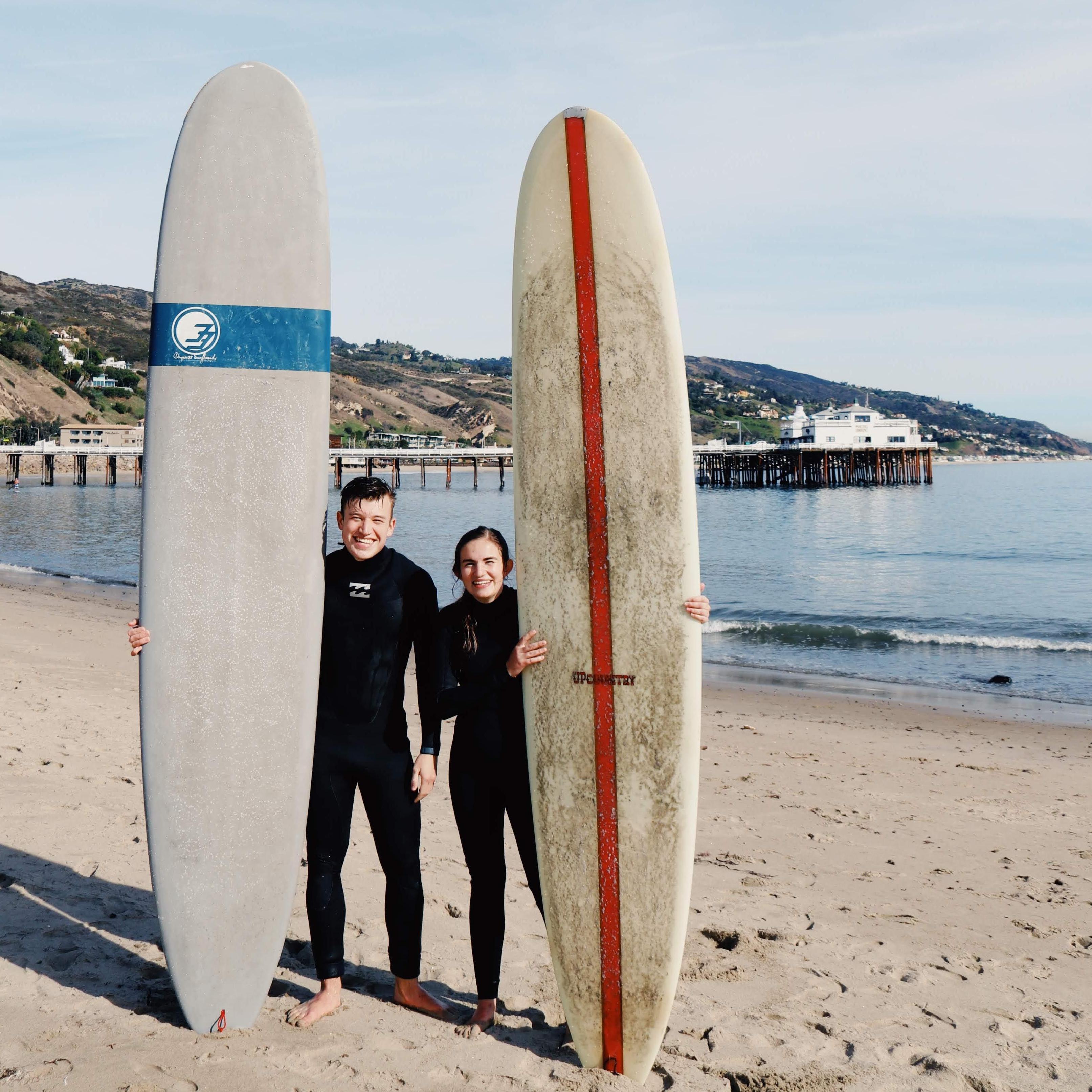 Rachel teaching David to surf!