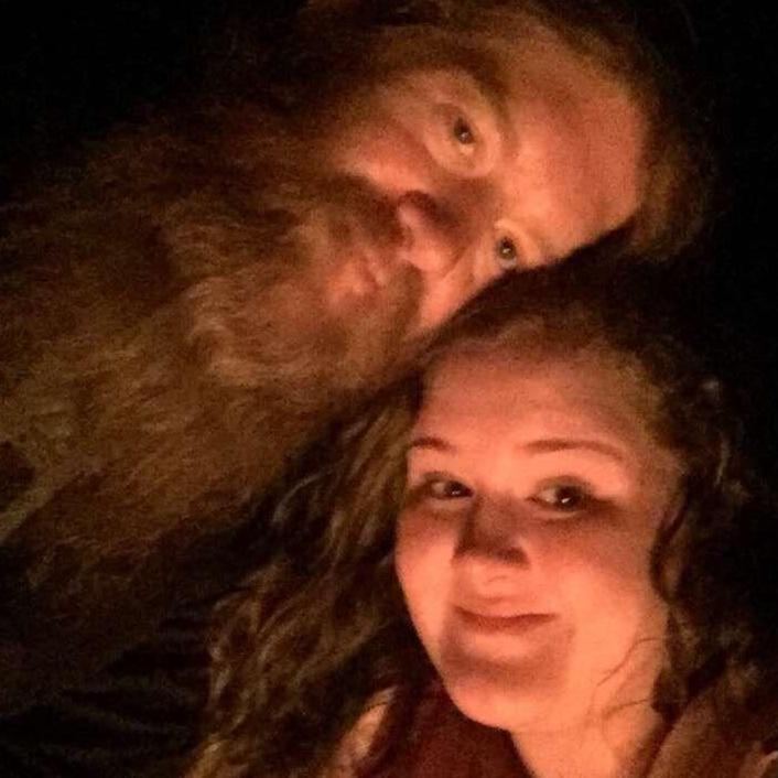 Around a bonfire on Spring Break near Pensacola, Florida.