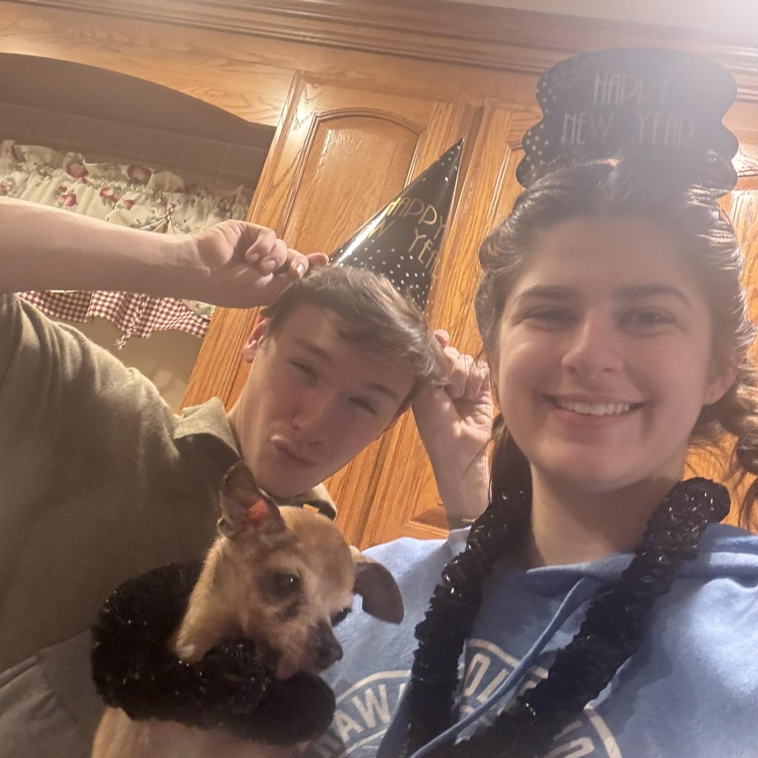 Starting off 2025 newly engaged and with my favorite boy Taco!