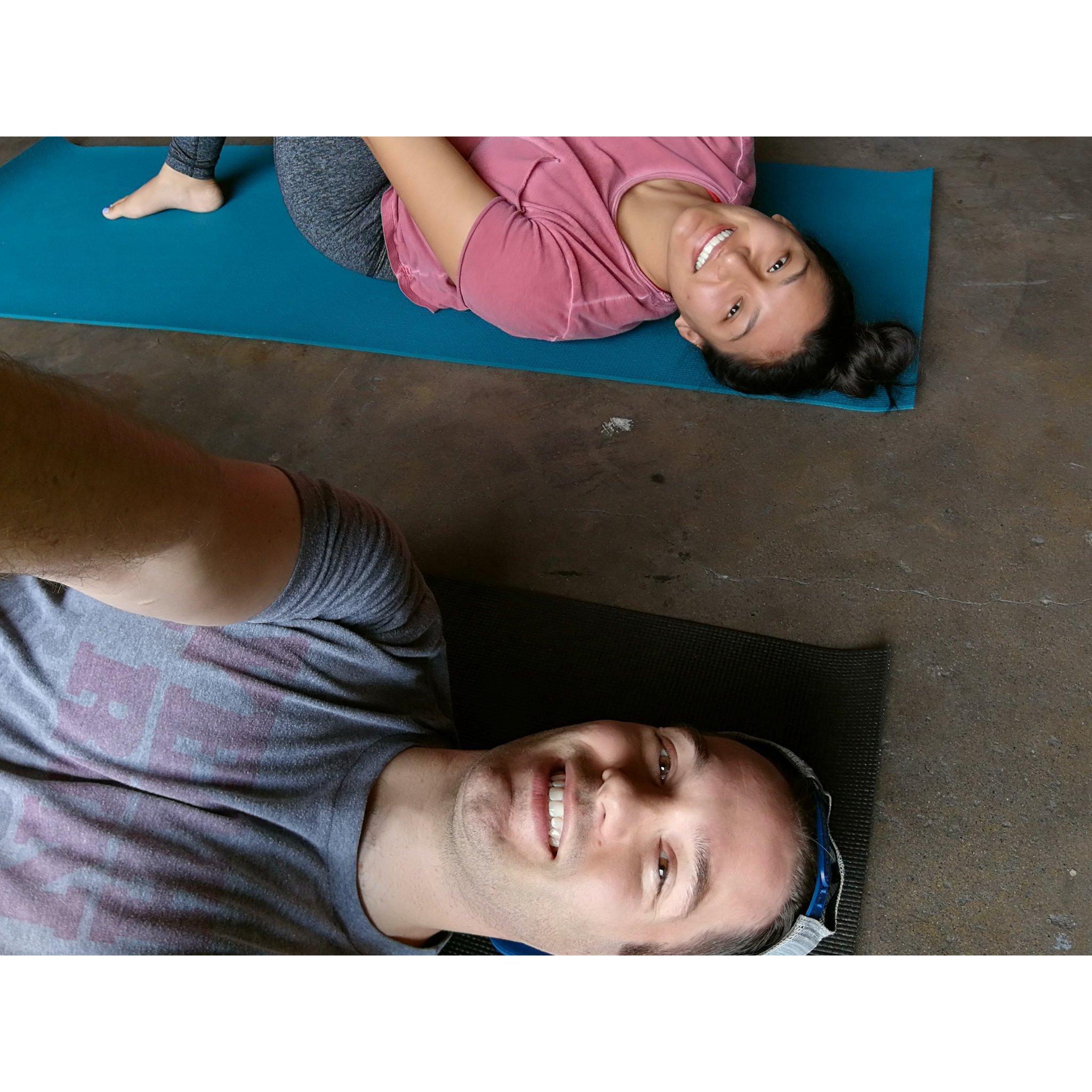 Attempting to stretch out our tight runners' legs.