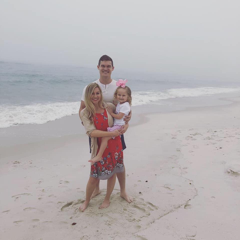 Eric and Brit with their Goddaughter, Reece. She is also their flower girl.