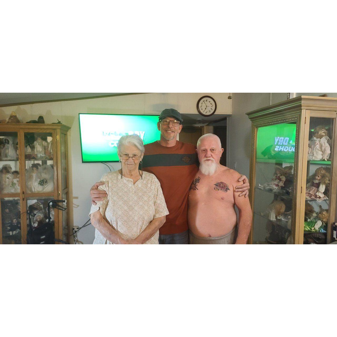 Kevin and his mom and dad. I love this picture!