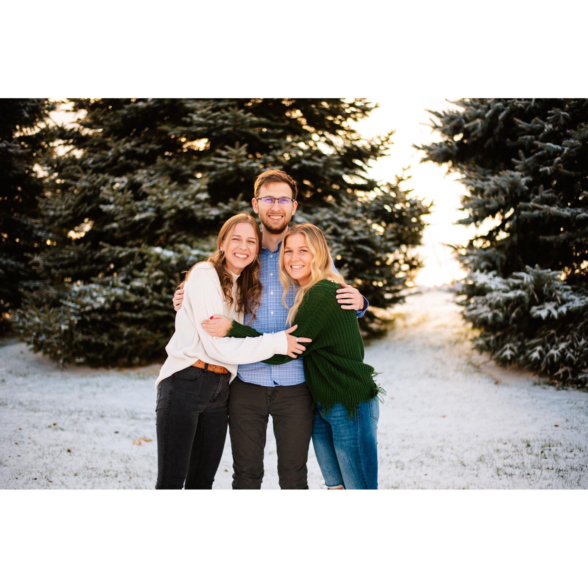 Bryce with his sisters Bailey (left) and (Brooke) out in the cold Nebraska snow behind their childhood home.
