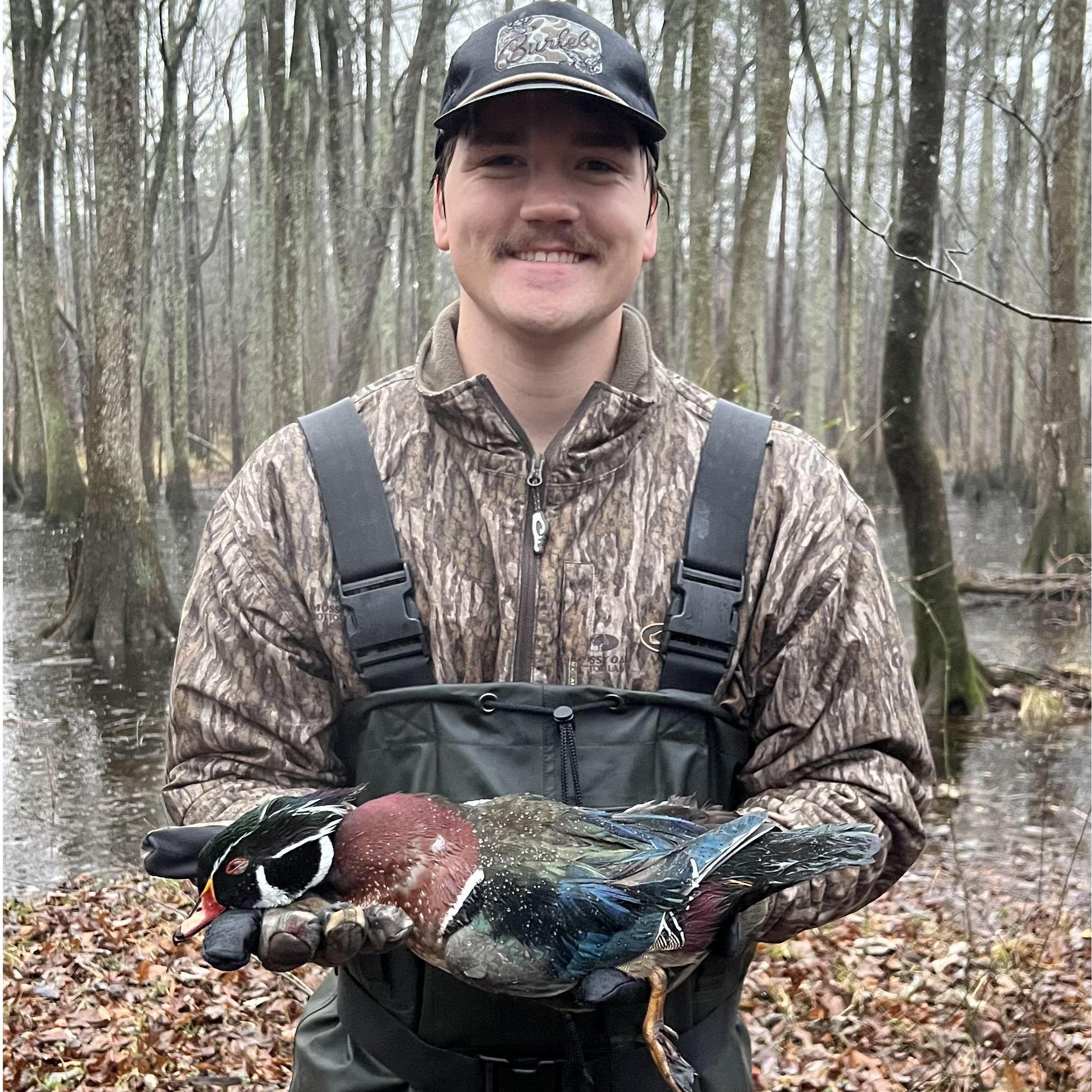 Eli shot his first duck on one of the hunts that I coordinated! A beautiful drake wood duck.