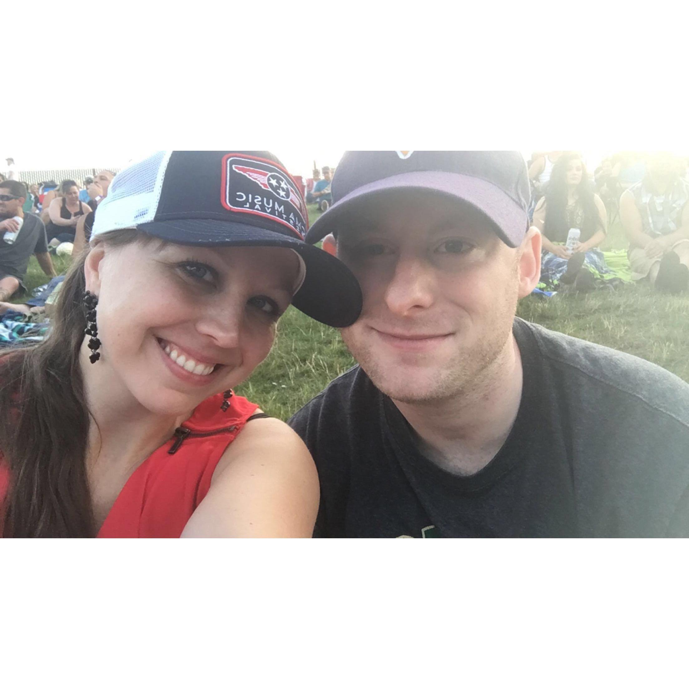 At a Brad Paisley concert: just a few months after we started dating.