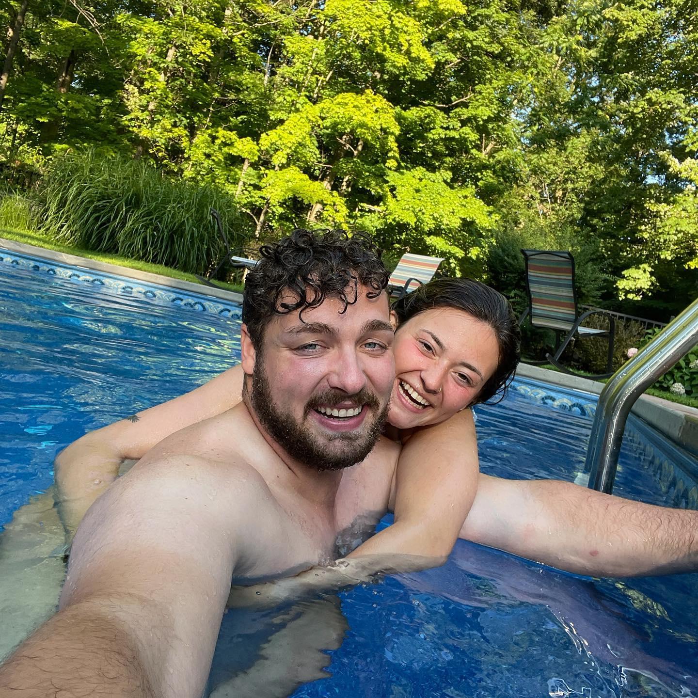 Enjoying the perks of a parental pool.