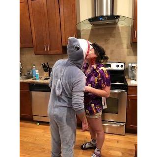 A very big scary shark and his victim