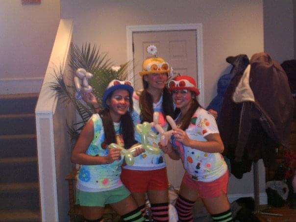 Circa 2007.  "Cute” clown in the middle from the costume party on the day they met.