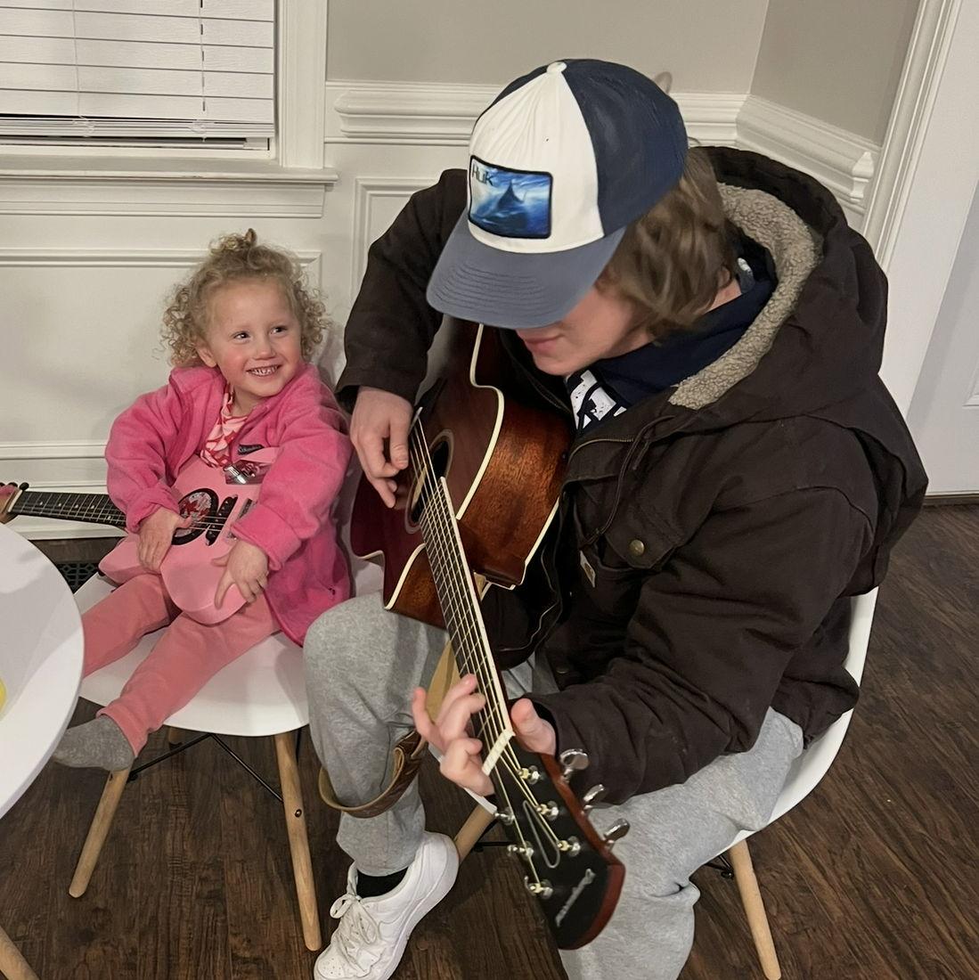 Brynlee loves to play guitar with her dad
