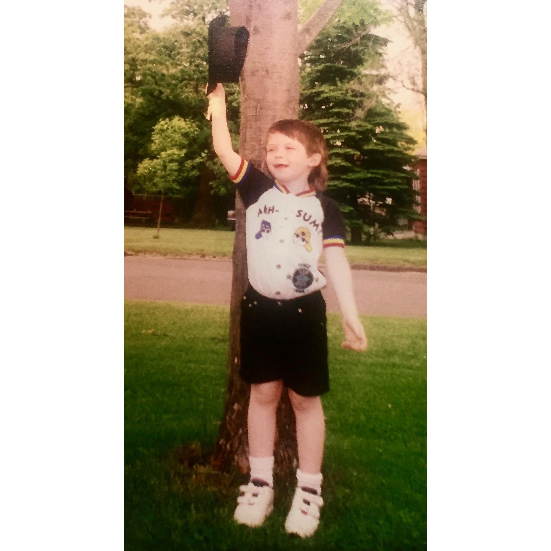 Little dork in a top hat.