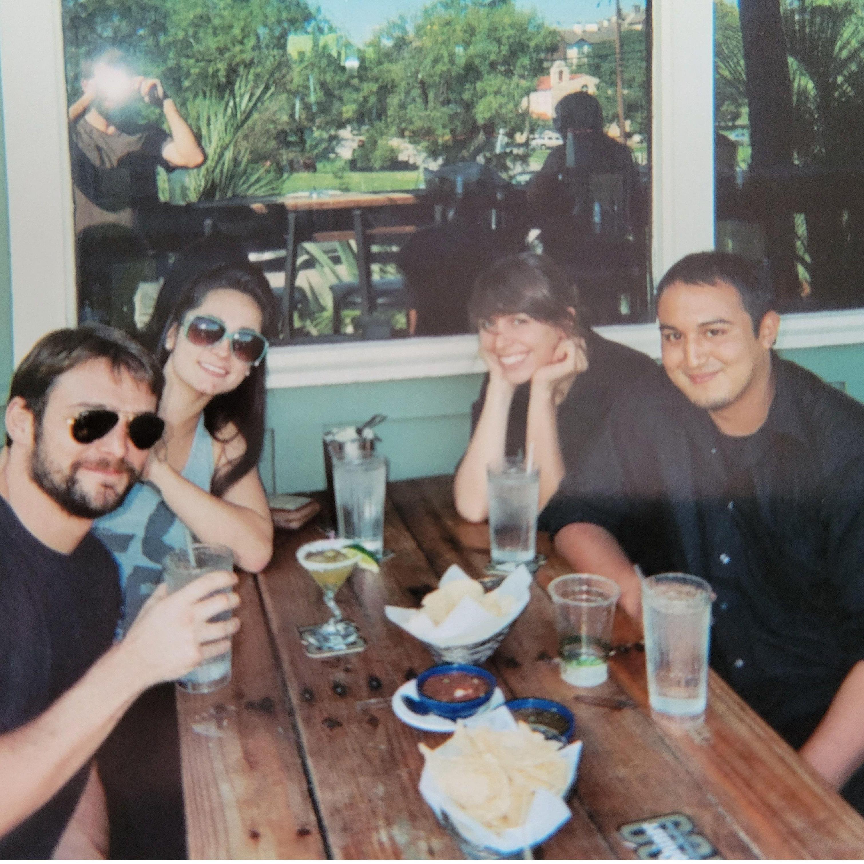 - 2010 - Some Clay Pit Staff hanging out after work. This is the first picture taken of Allison and Justin together. Justin is in the reflection of the window, taking the picture.