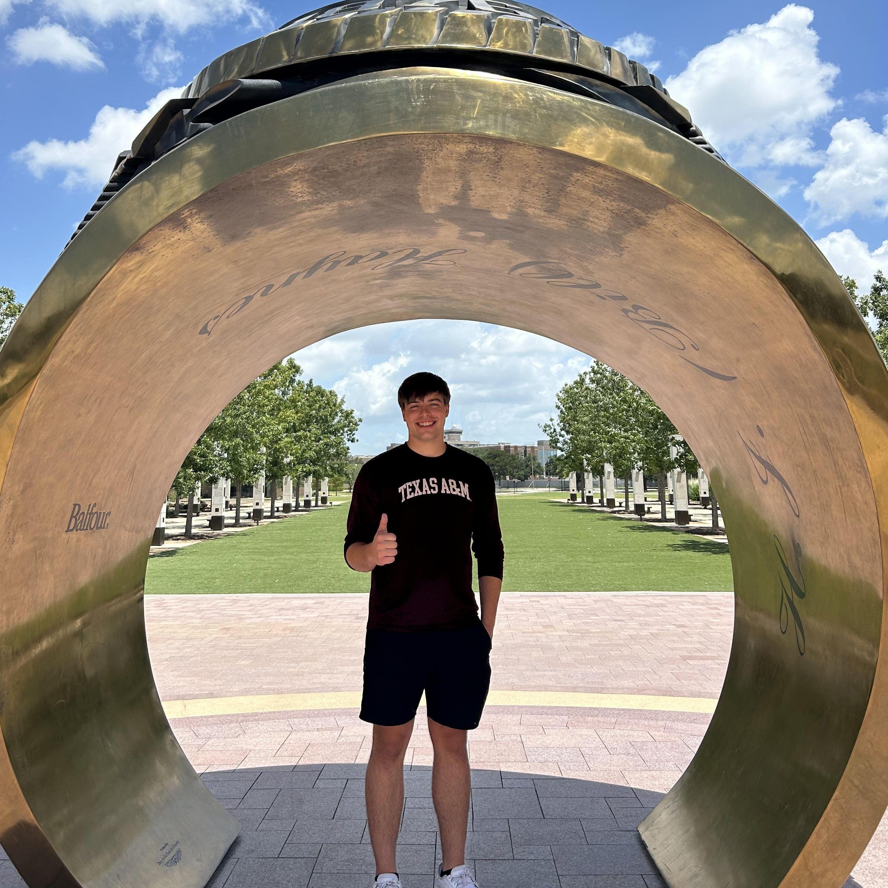 Ben ordered his aggie ring, and Kylee made him take this photo! He was a good sport.