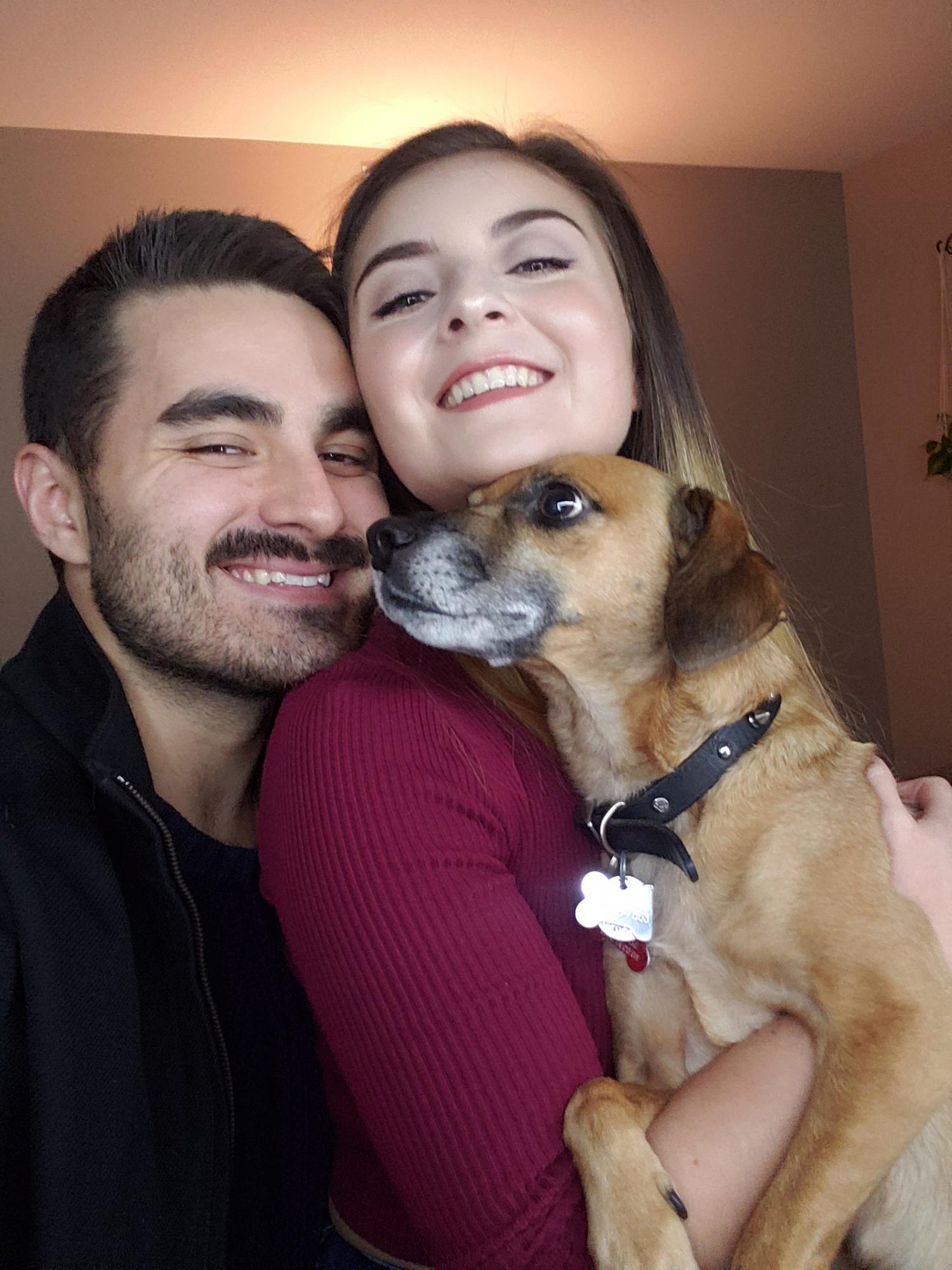 A family photo we took in our apartment with Scraps before Thanksgiving of 2021.