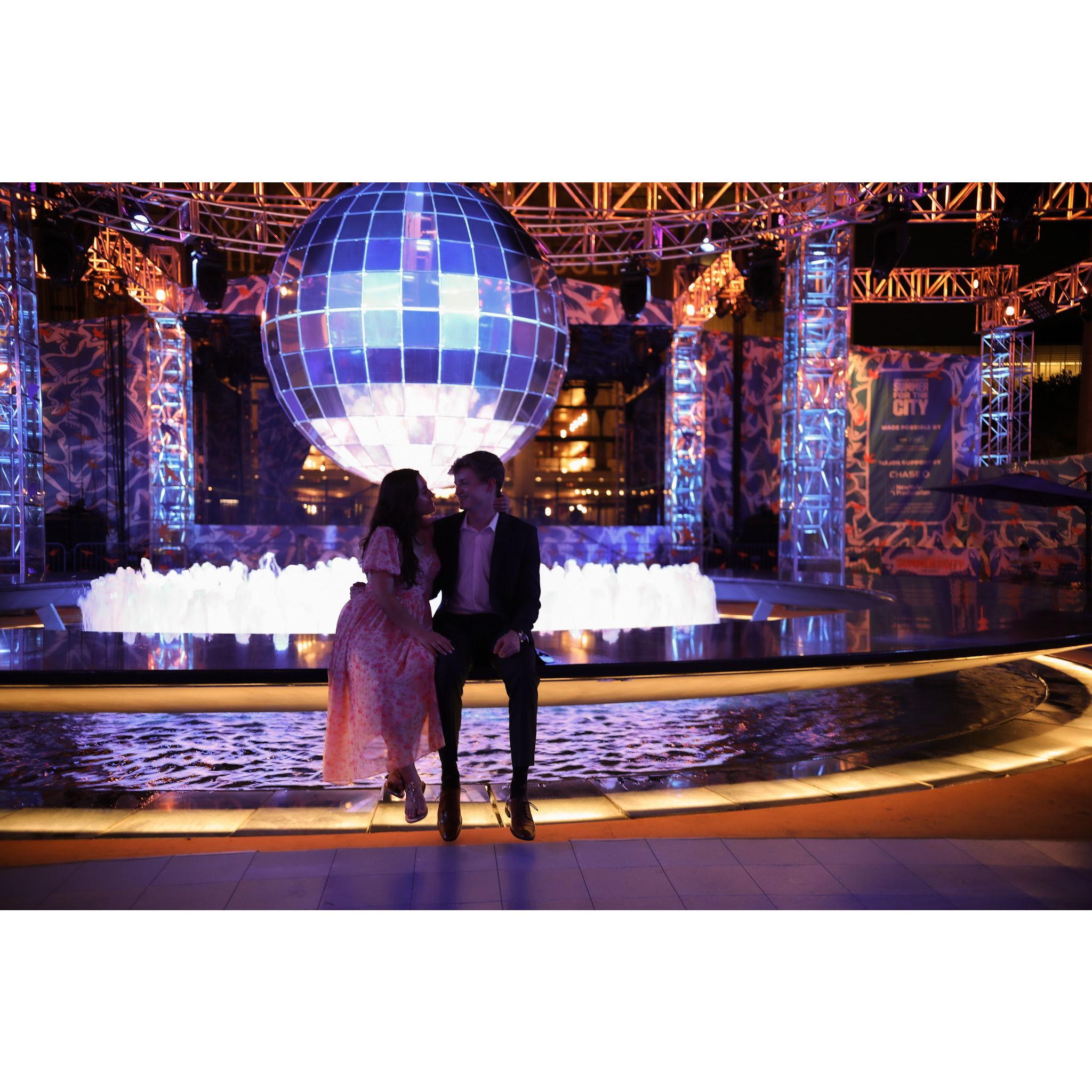 The fountain at Lincoln center was covered by a disco ball the day we got engaged. We had to get a picture because of the hilarious coincidence!