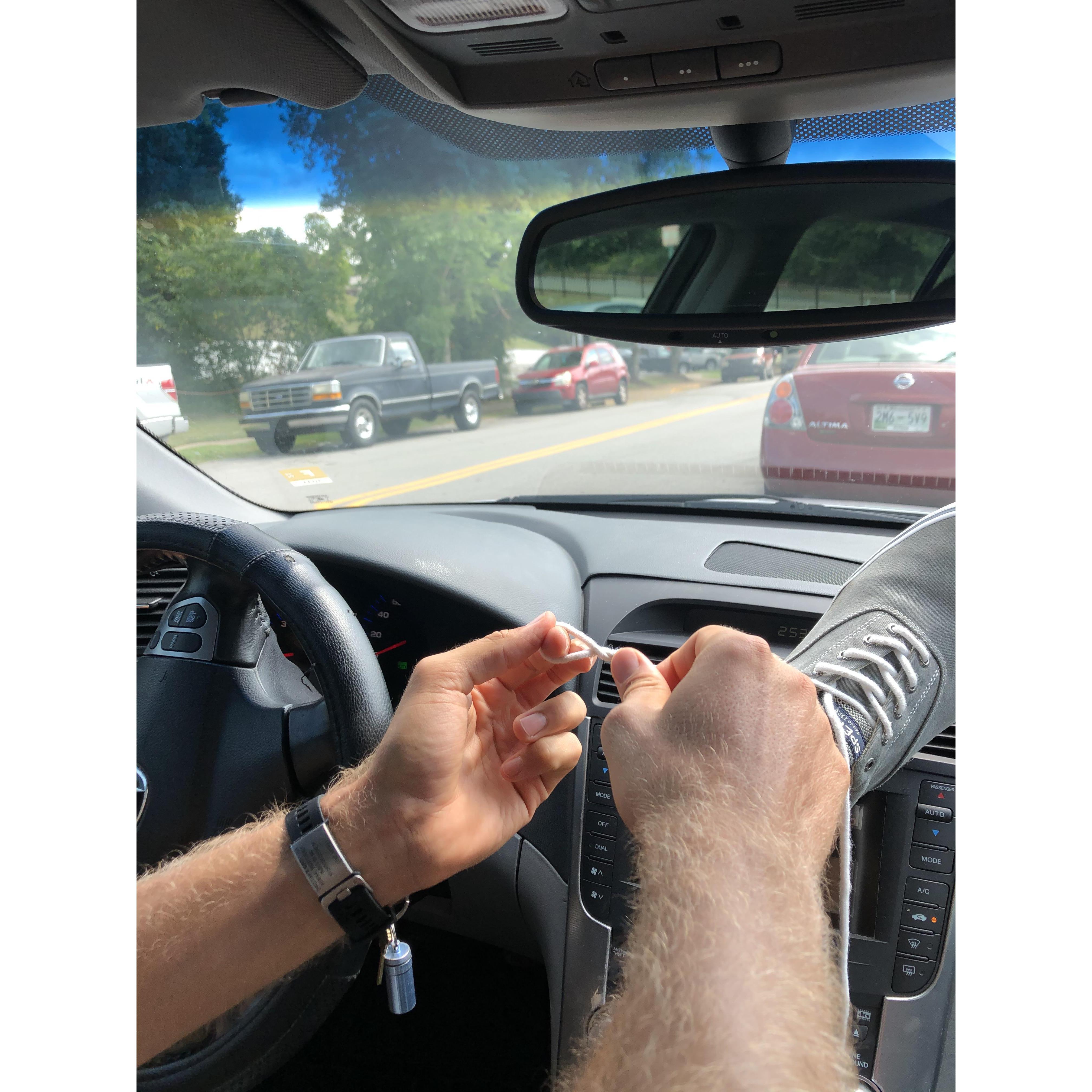 Christian practicing his figure-eight knot before rock climbing with Erin.