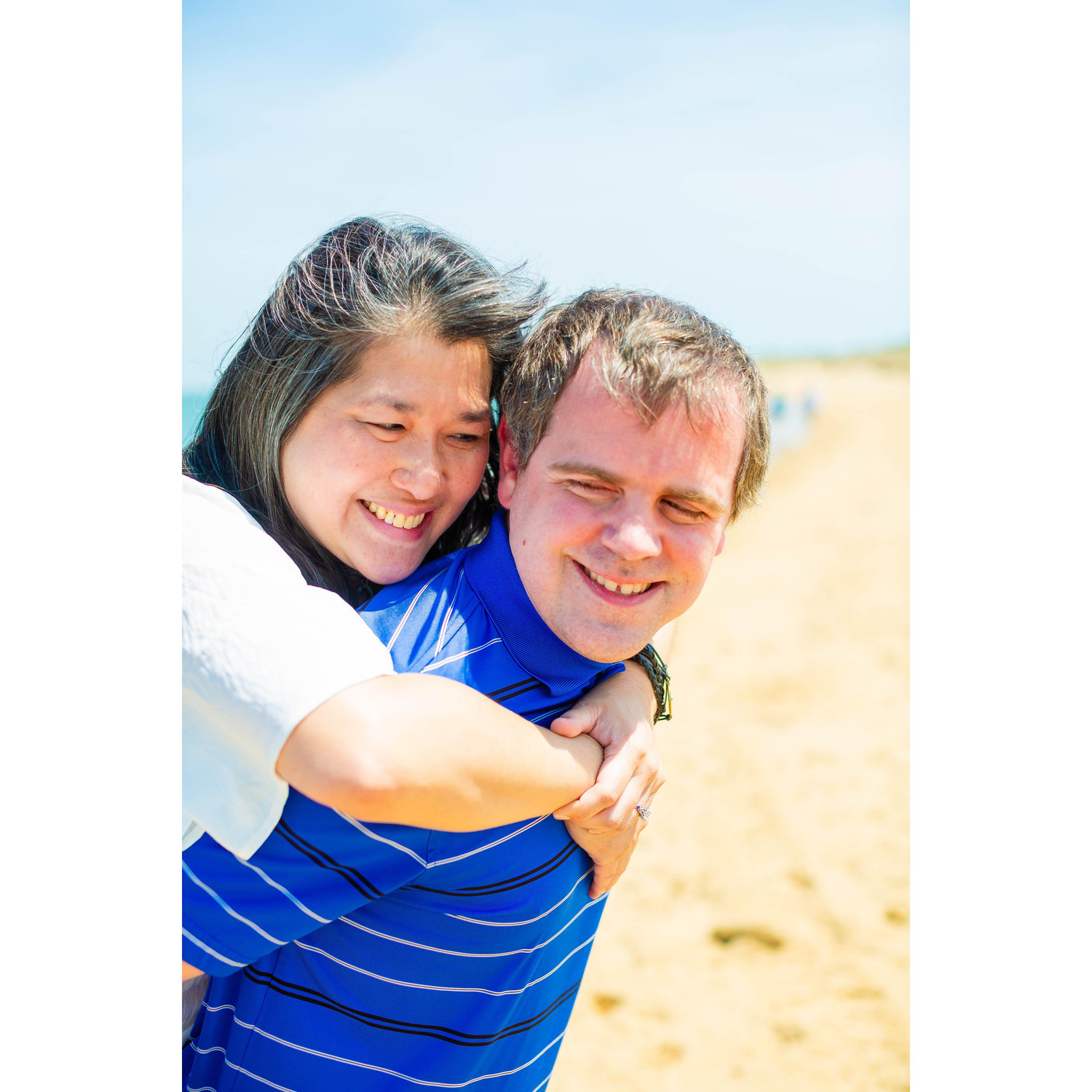 Engagement photos, May 2025. First Landing State Park. How about a piggy back ride?