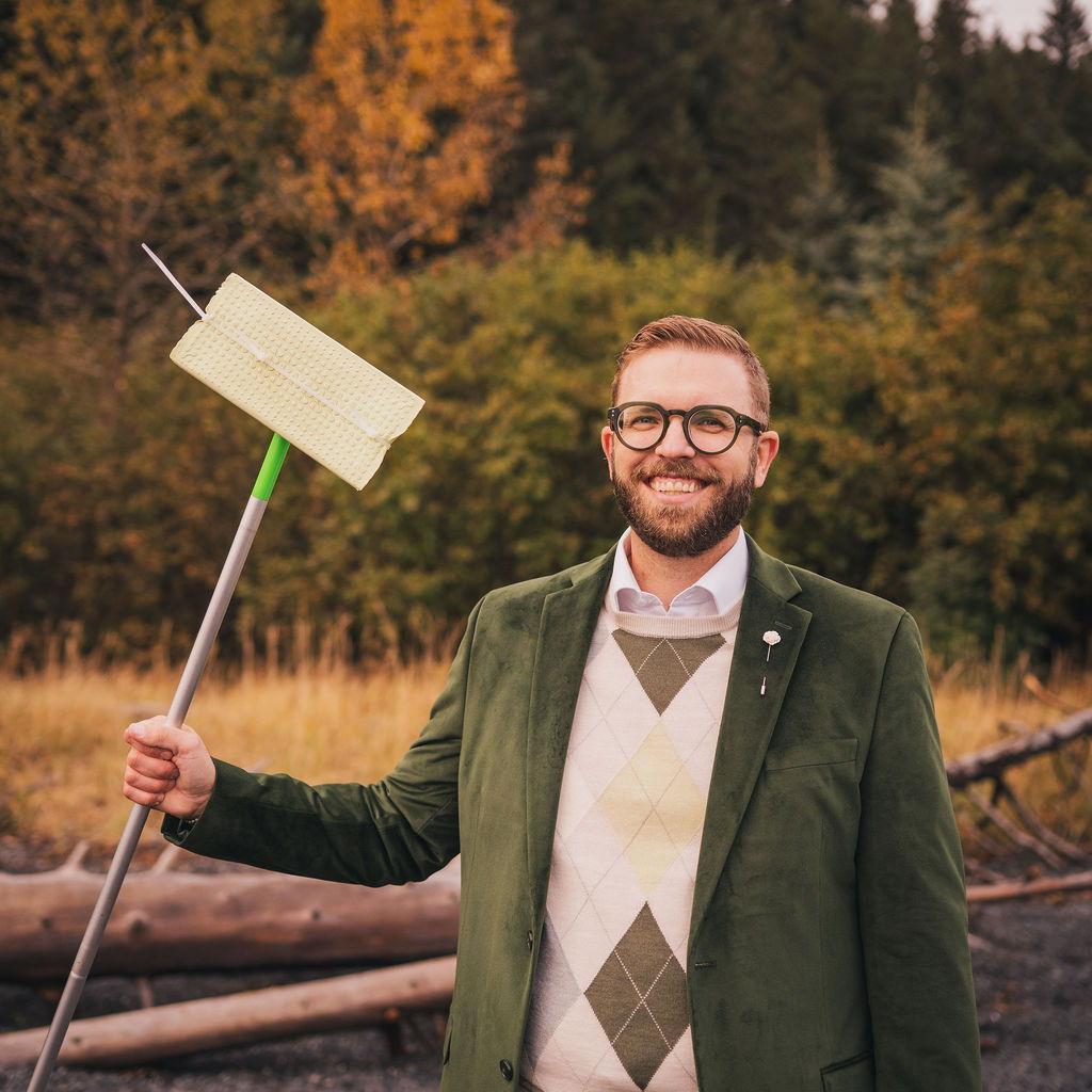 Brad jerry rigged this swiffer to film the wedding.