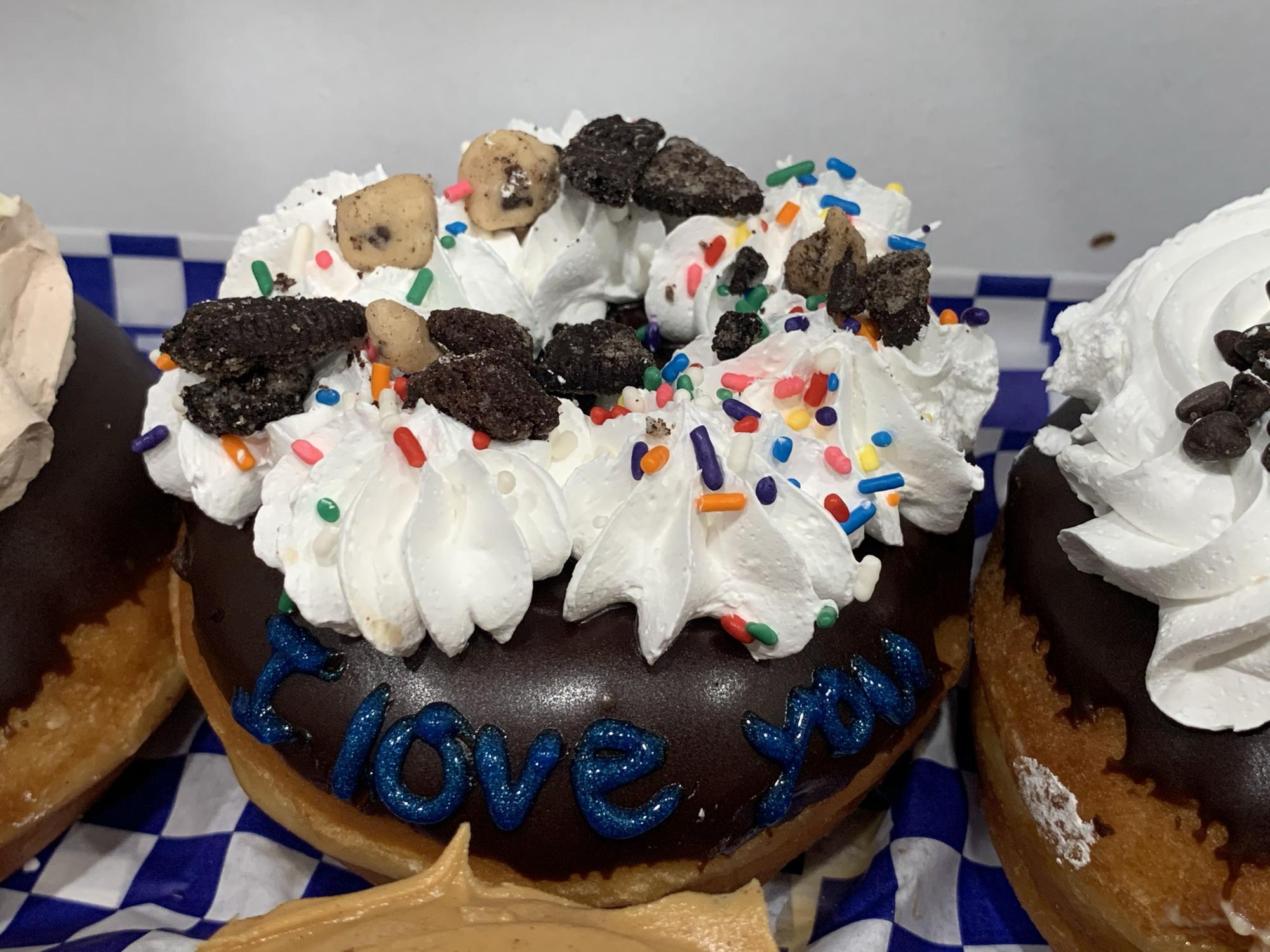 What better way to say 'I love you' for the first time than with a doughnut from DG Doughnuts? Don't worry, they'll make an appearance at the wedding!