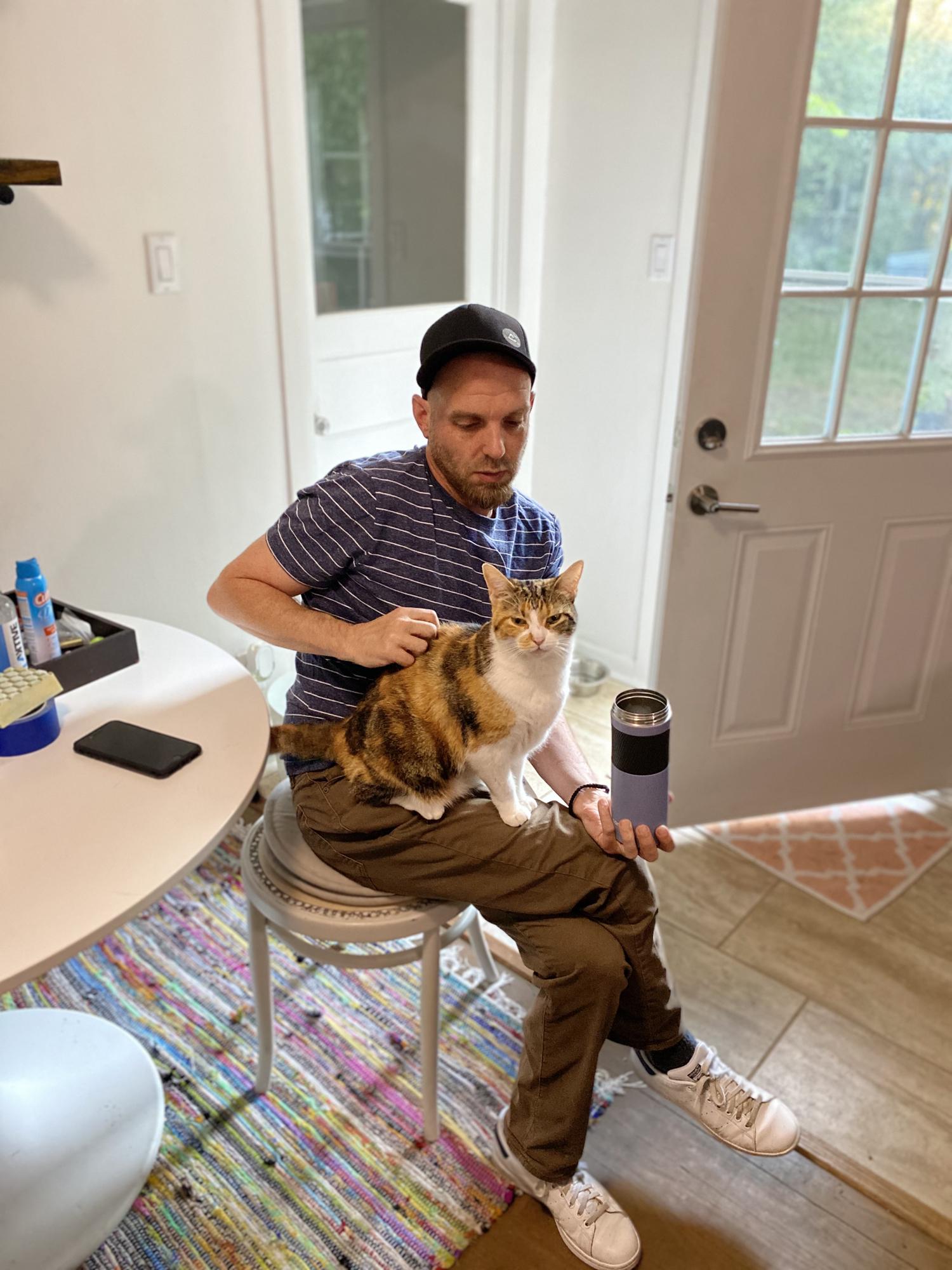 Jason and Caly - Jason has officially adopted Elizabeth's cat. Caly loves Jason more than Elizabeth which is offensive.