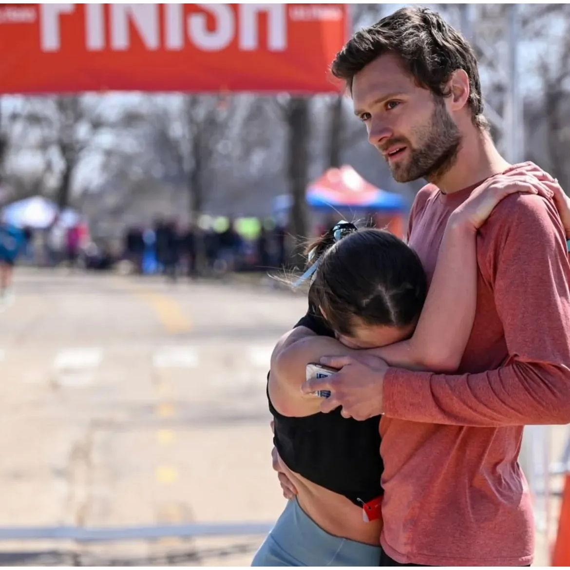 Tommy mentally and physically supporting Sophie post 50-kilometer in Madison, Wisconsin!