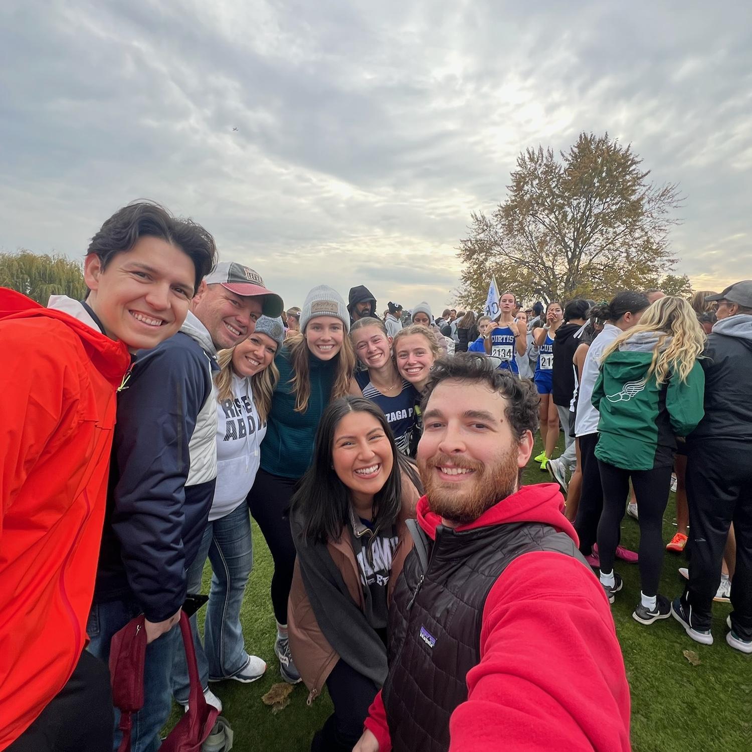 The Spakousky fam cheering on Alese's State XC championship!