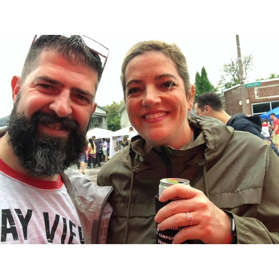 Enjoying a rainy day at Bay View Bash when we lived in our first apartment