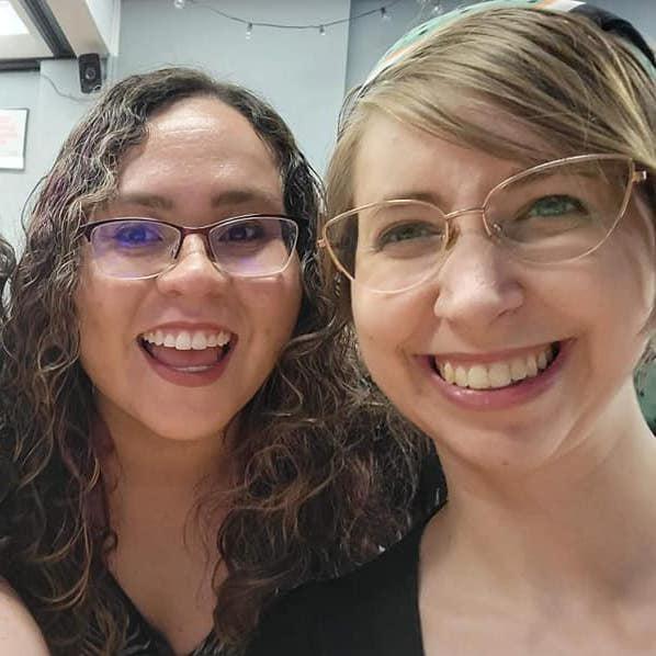 July 2022: Berenice, one of the two friends who set us up, taking a picture with Erin a few minutes before she meets Brian for the first time.