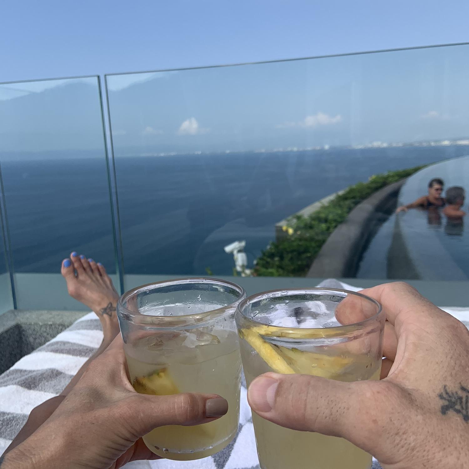 Another toast to us from our rooftop pool at Mousai in PV, November 2021